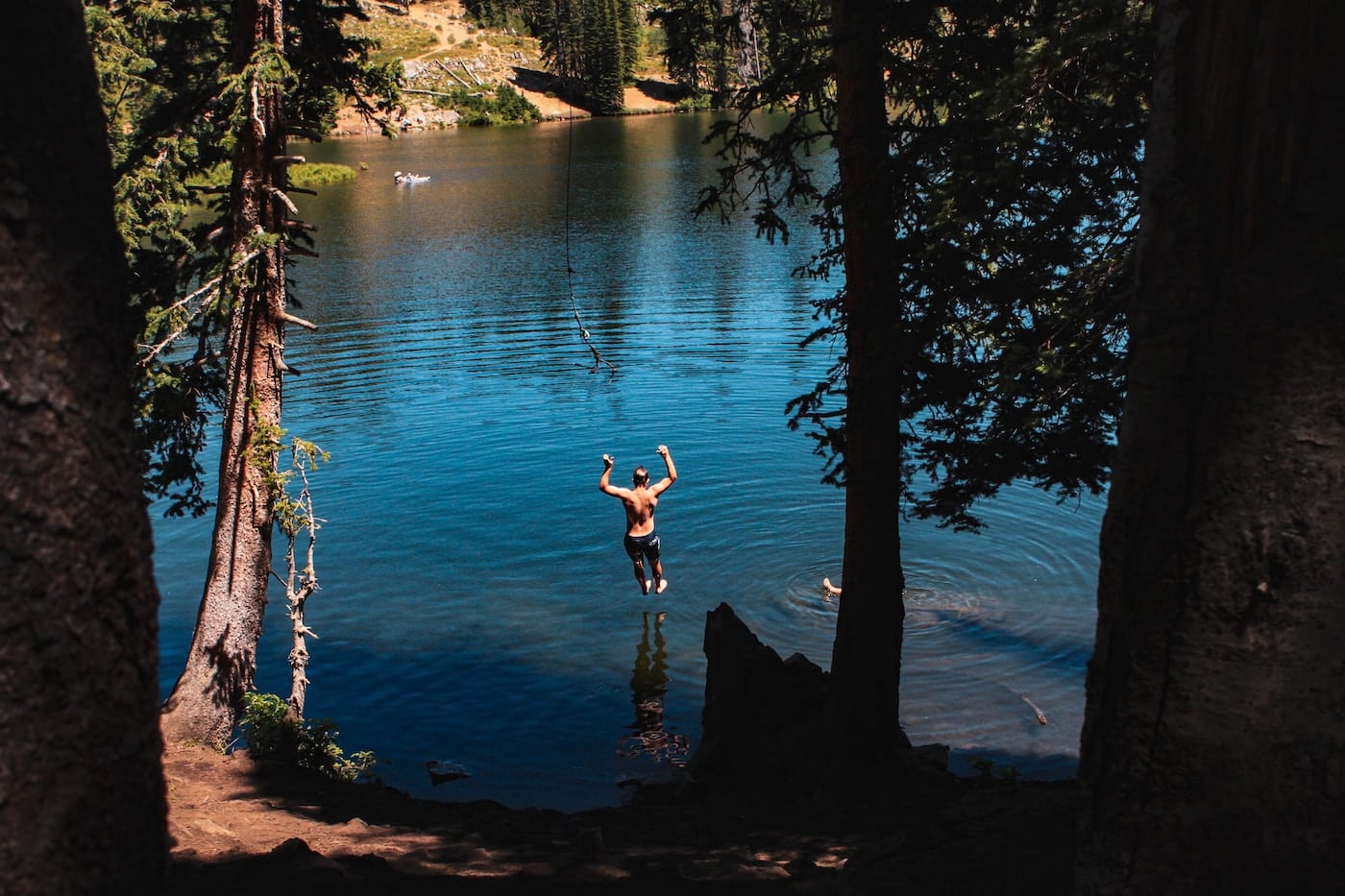 man jump into river at daytime-Things to Do on a Lake