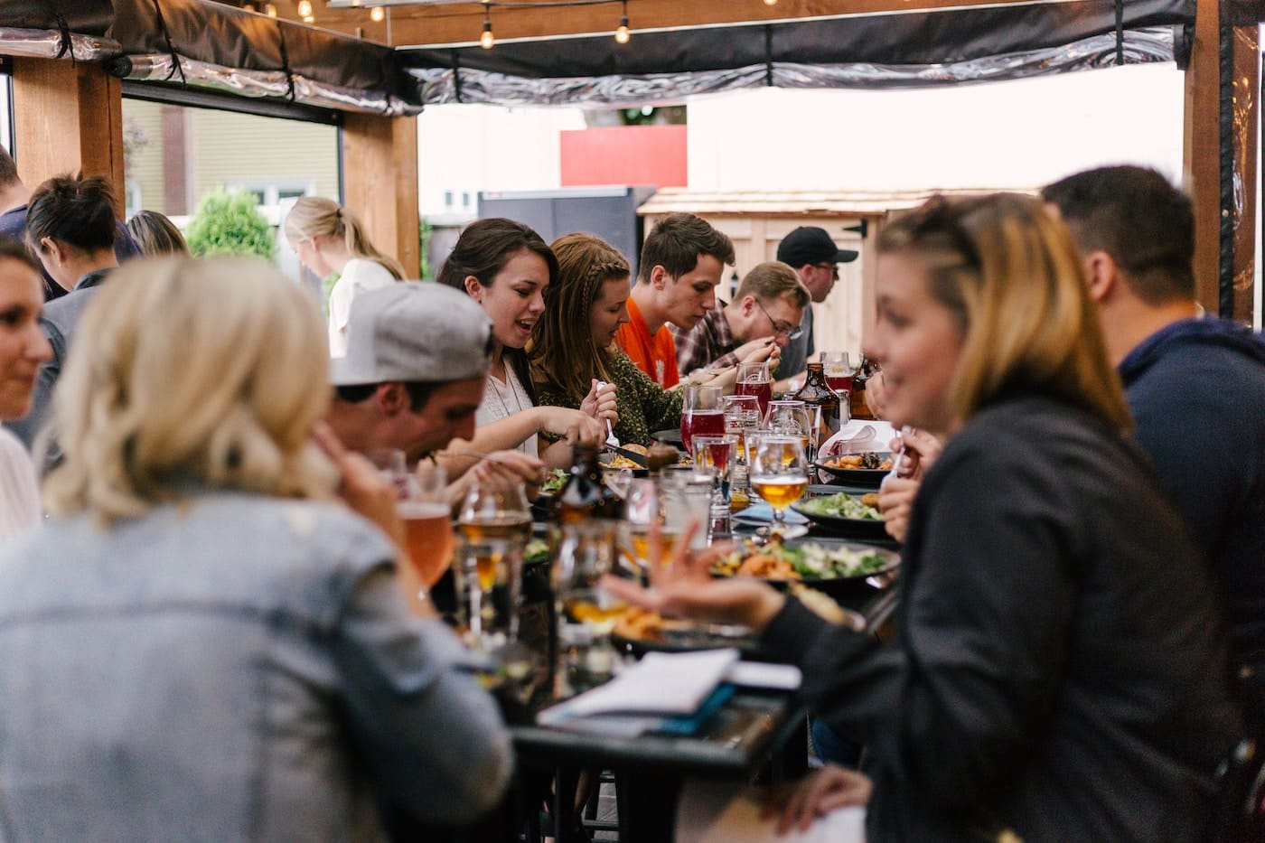 people sitting in front of table talking and eating-irish food tours