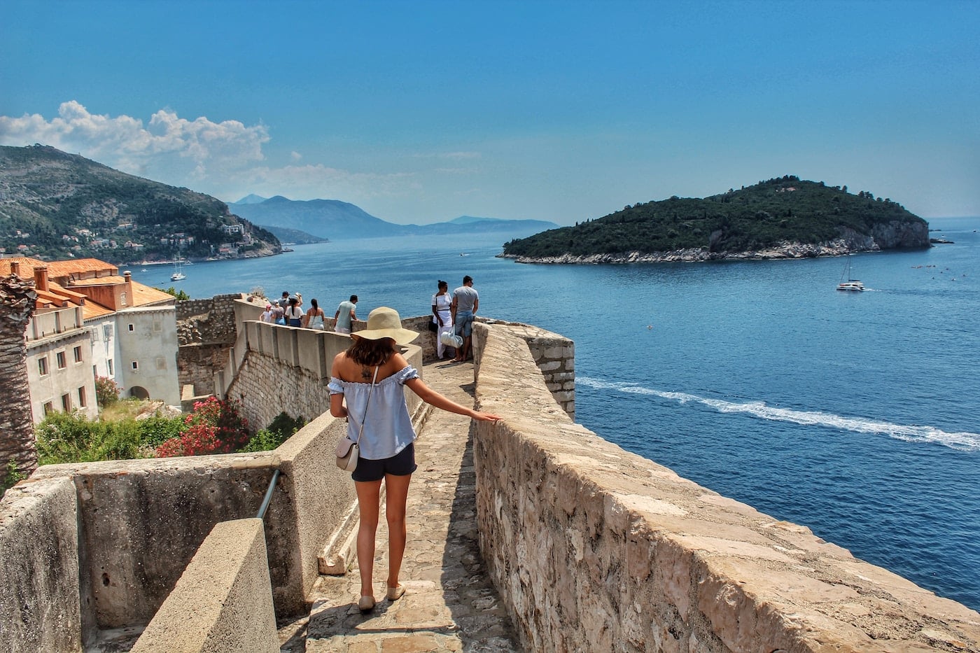 people walking on concrete pathway-Croatia Solo Travel