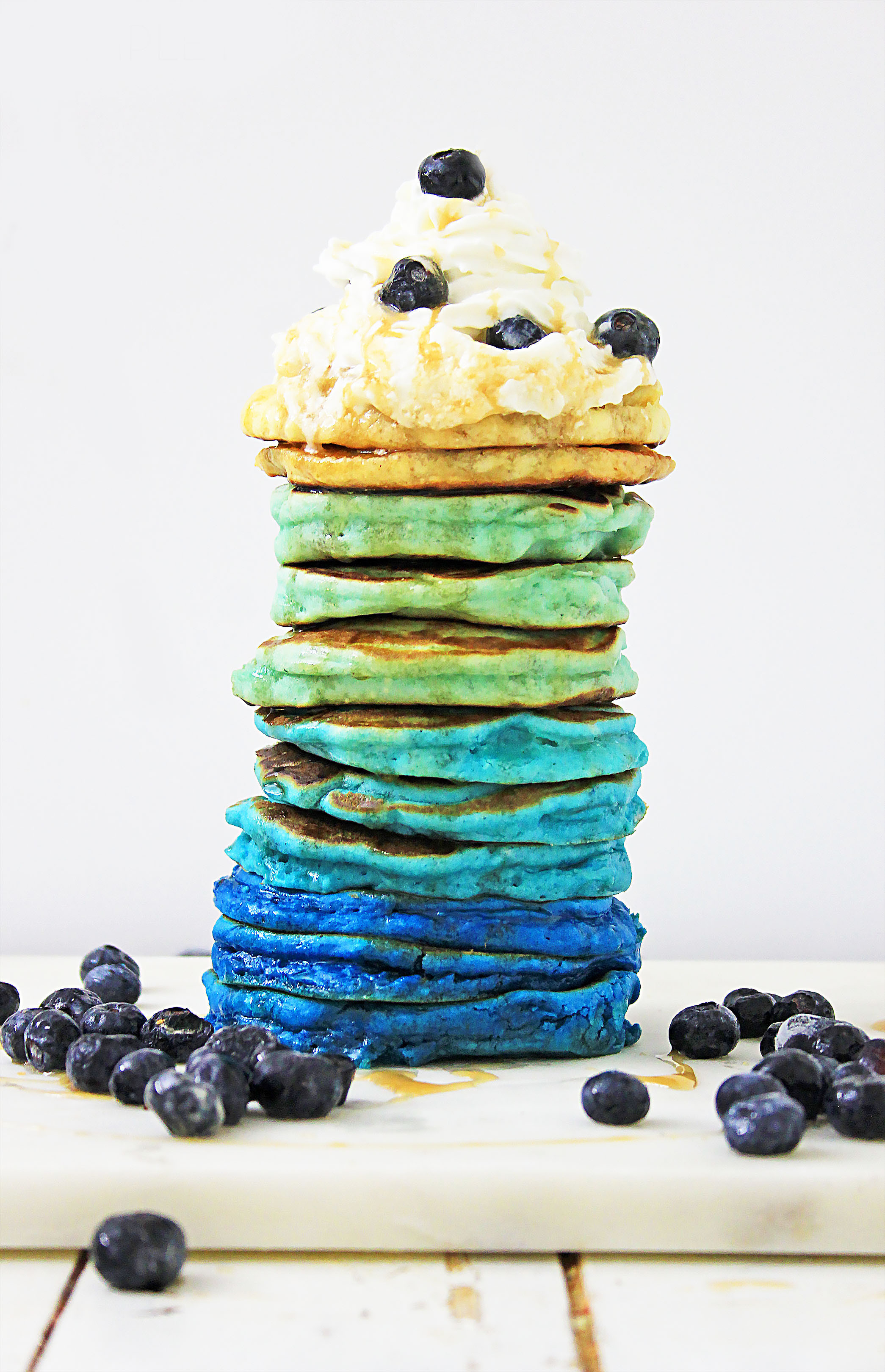 A stack of ombre blueberry pancakes