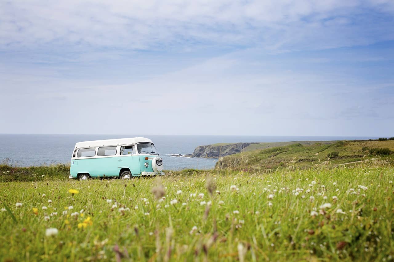 A VW bus at a campground