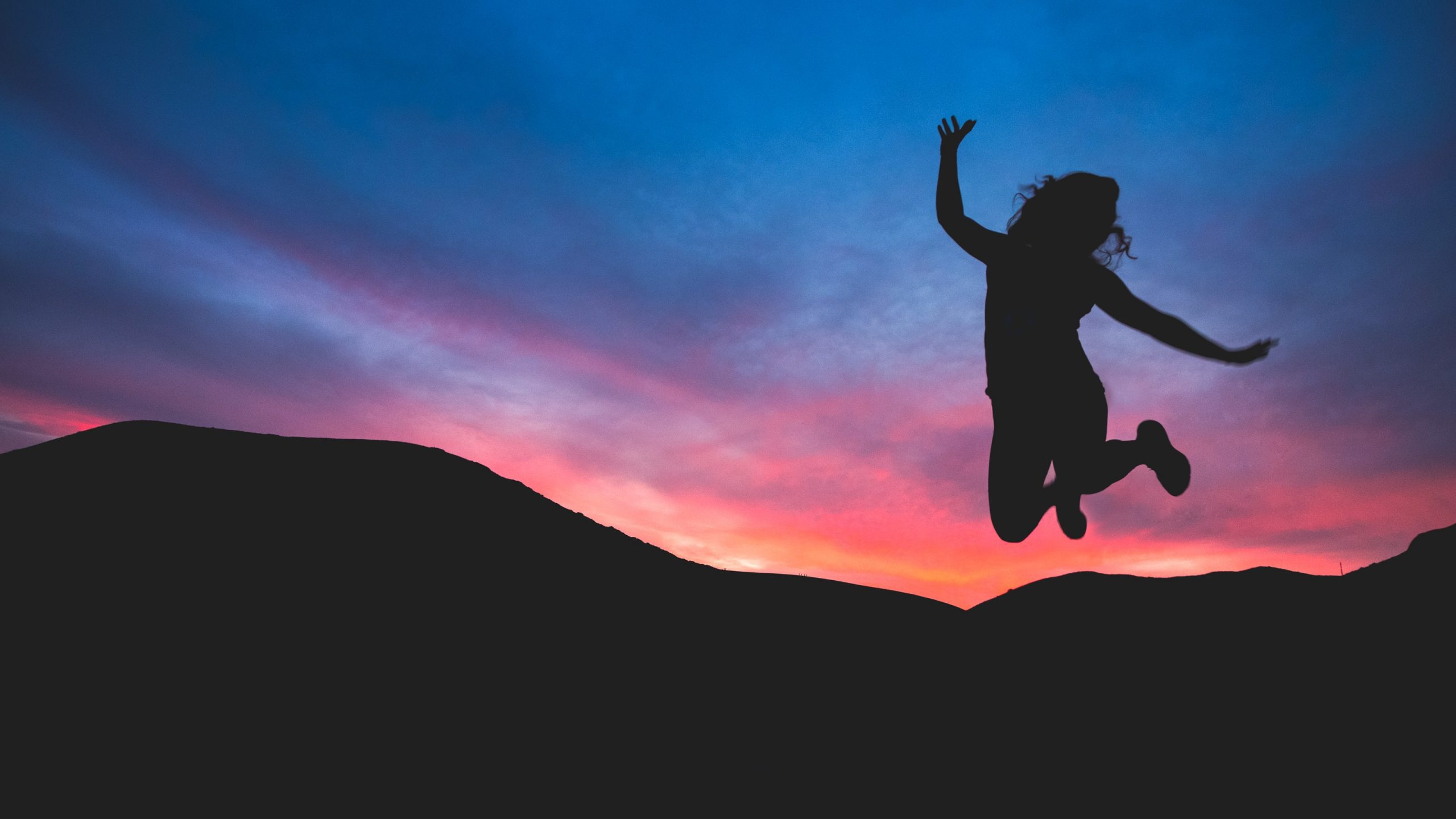 silhouette of girl jumping