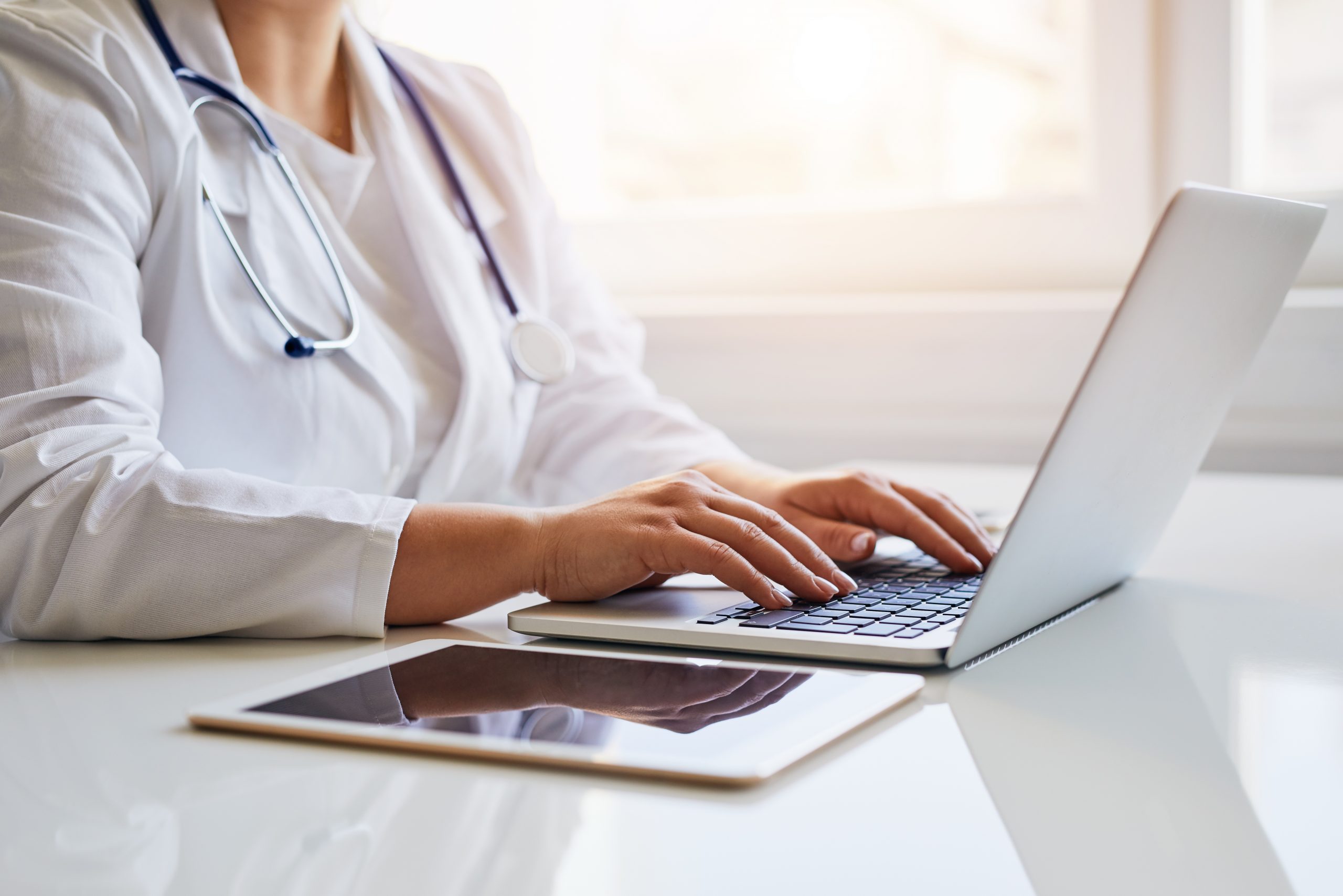 A female doctor at her laptop