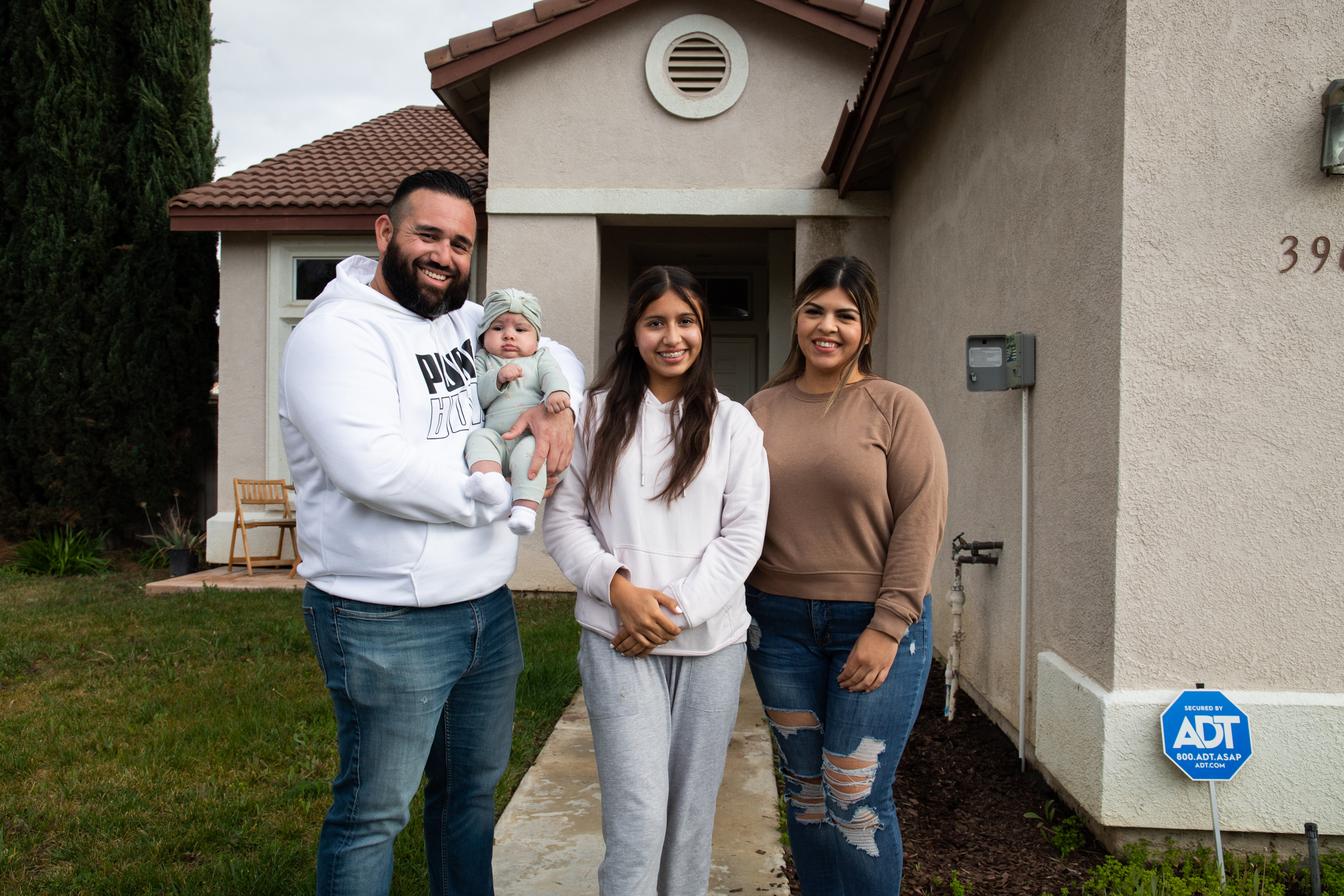 The Lopez-Beltran family moved to the city of Murrieta due to the high cost of living in San Diego. Dohney Castillo (far left) commutes daily to his job at Republic Services in Chula Vista. / Photo by Adriana Heldiz