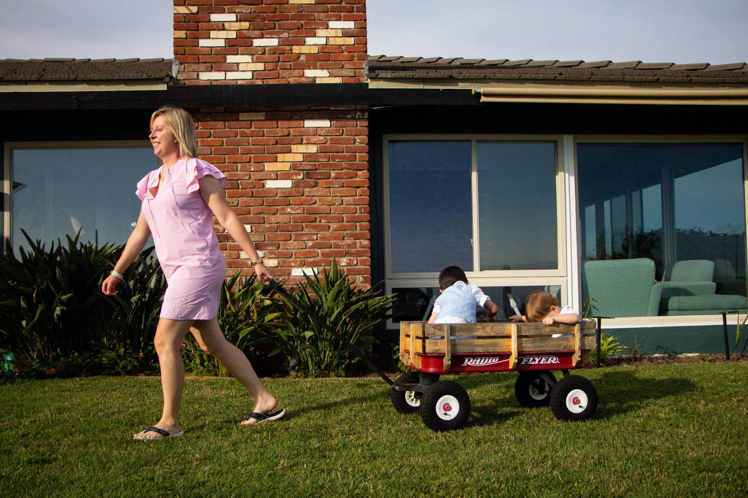 Rebecca Williams, SDUSD board candidate plays with her two sons in her home in Pacific Beach, CA.