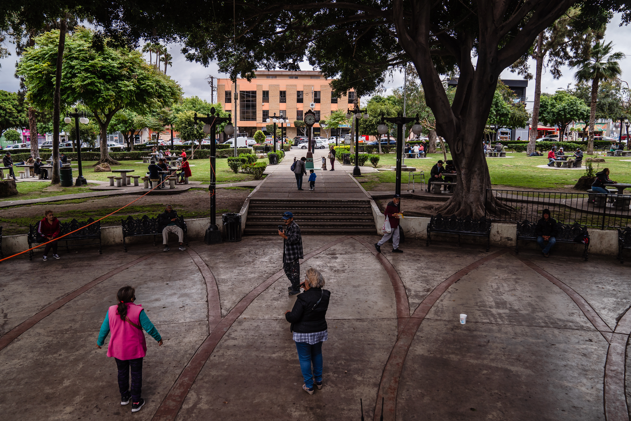 A woman sings at Parque Teniente Guerrero in Tijuana on May 31, 2023.