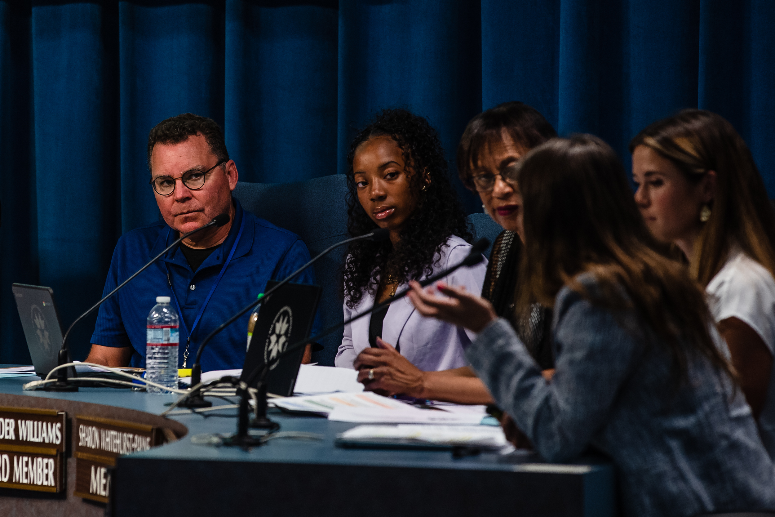 (From left to right) Board Trustee Richard Barrera, Student Board Member Blessyn Lavender Williams and District E Board of Education Trustee Sharon Whitehurst-Payne during a San Diego Unified School District meeting in University Heights on July 11, 2023.