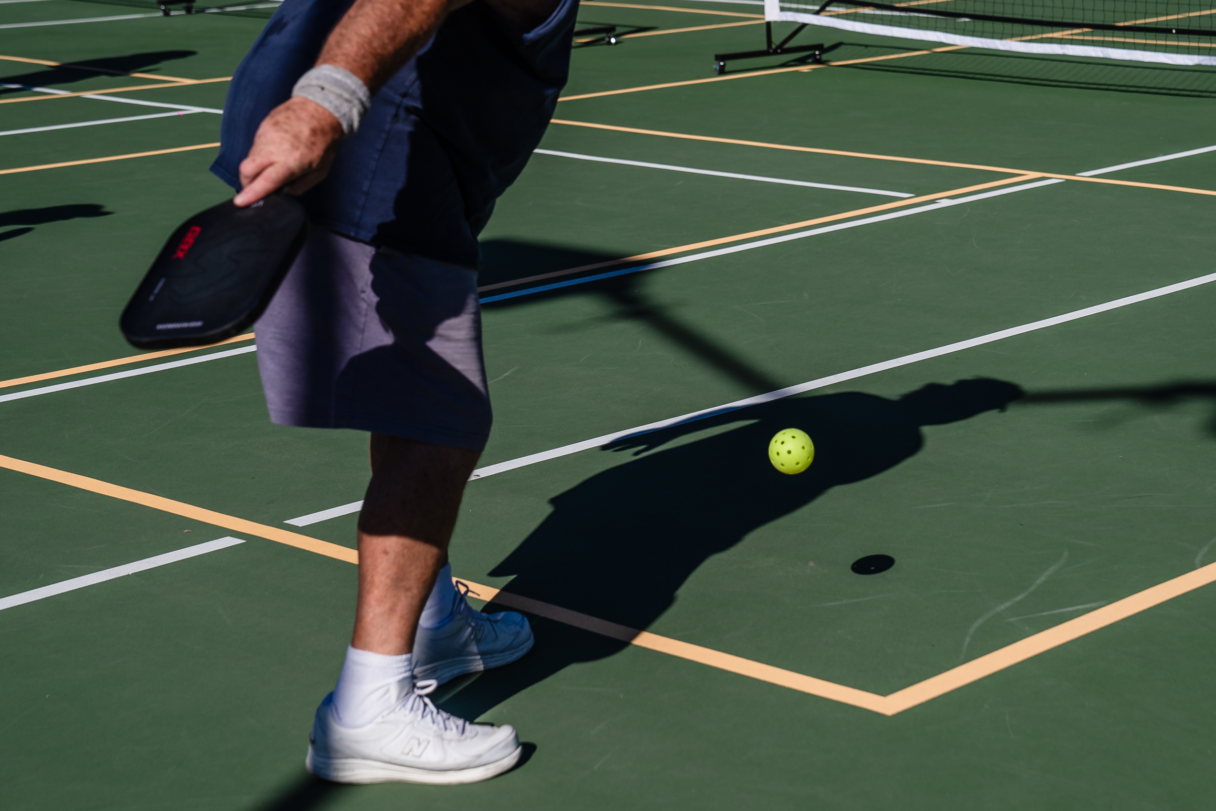 A man plays pickleball at San Diego Pickelball at the Mission Bay Resort On Nov. 28, 2023.