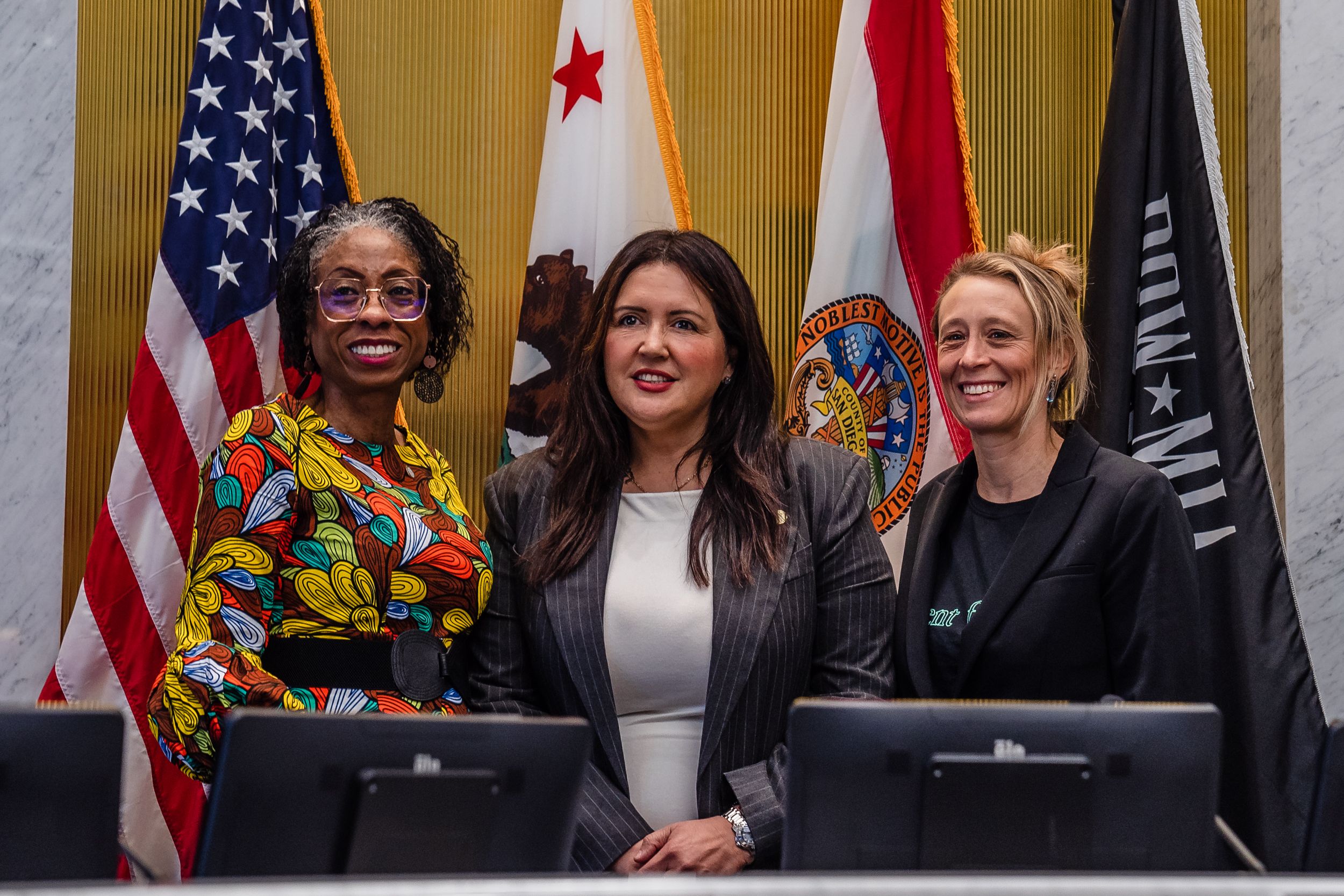 San Diego County Supervisor for District 4 Monica Montgomery Steppe (left), Chair Nora Vargas (center) of District 1 and Vice Chair Terra Lawson-Remer of District 3 pose for a photo at the San Diego County Administration Building in downtown on Dec. 5, 2023.