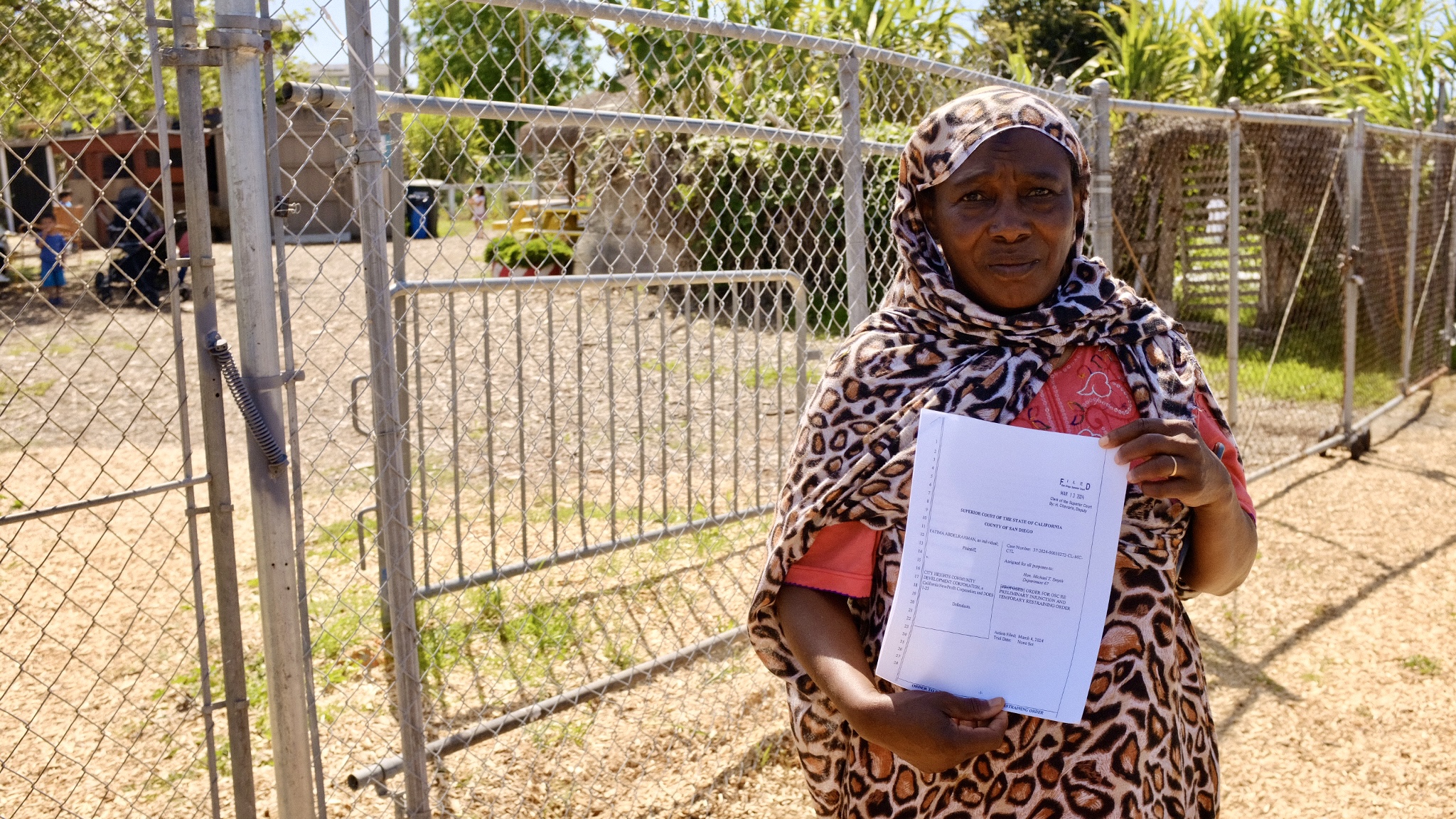 Fatima Abdelrahman, a Sudanese refugee, has gardened plots at New Roots Community Farm for over a decade. She sued the non-profit that manages the garden. / Photo by MacKenzie Elmer