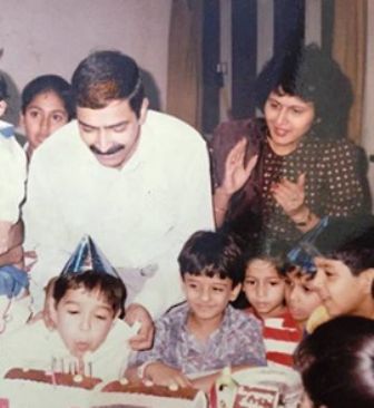 Varun with his parents