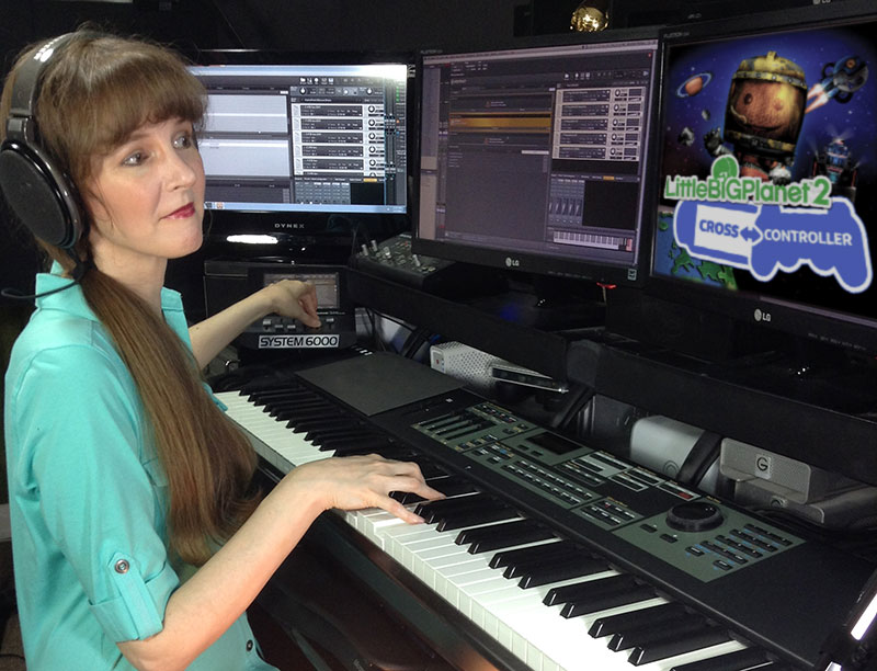 Award-winning video game music composer Winifred Phillips works in her music studio at Generations Productions on music for the project LittleBigPlanet 2: Cross Controller.