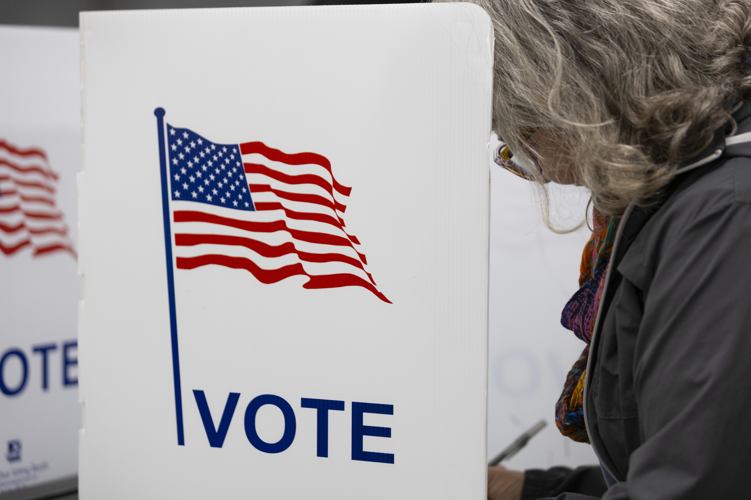 Vote sign with American flag image