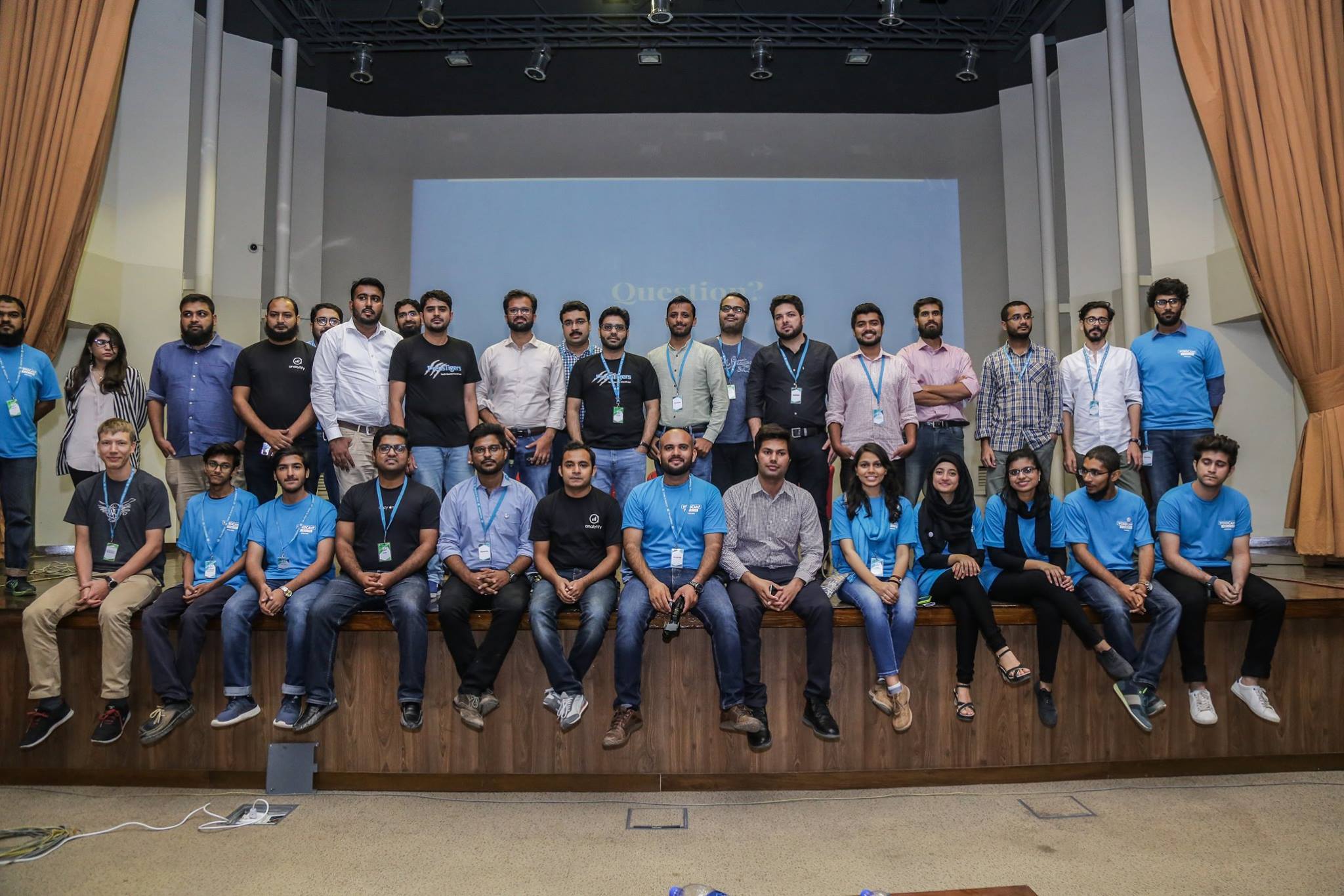 Abdullah Ramzan among a group of community members at WordCamp Karachi 2018