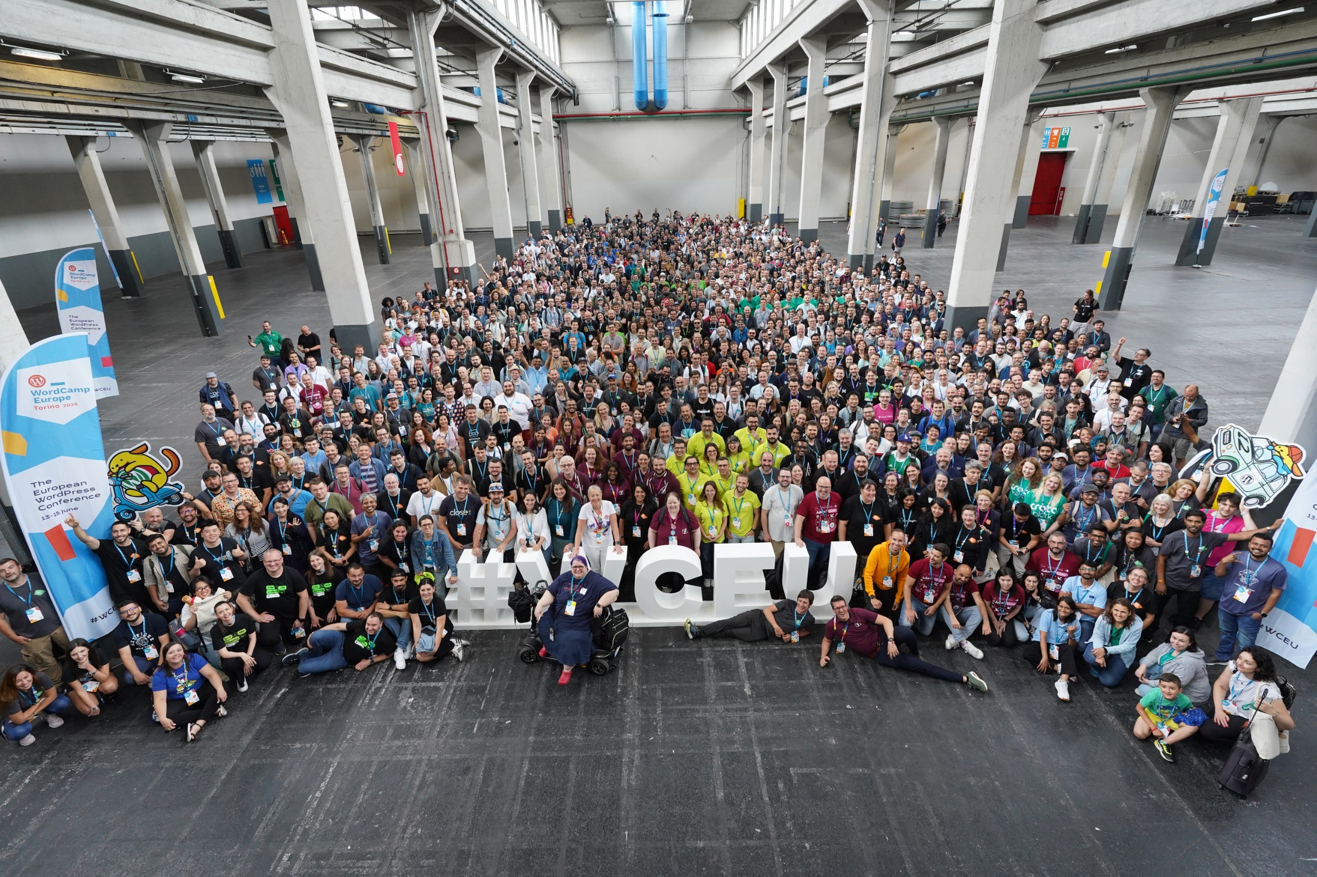 Attendees gather for a photo at WCEU in Torino. Photo by Nilo Vélez.