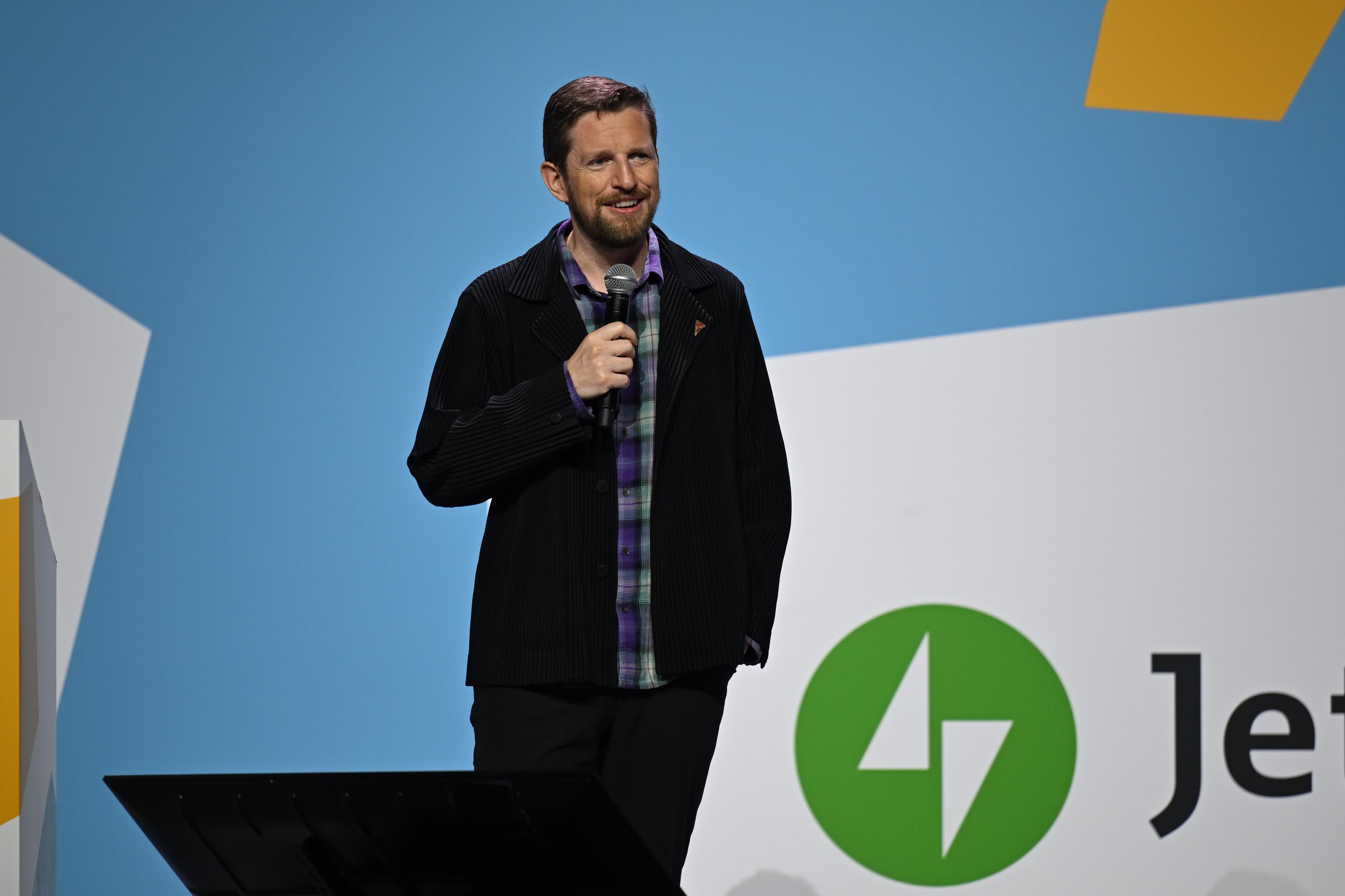 WordPress Cofounder Matt Mullenweg on stage at WCEU. Photo by Chris Clarke.