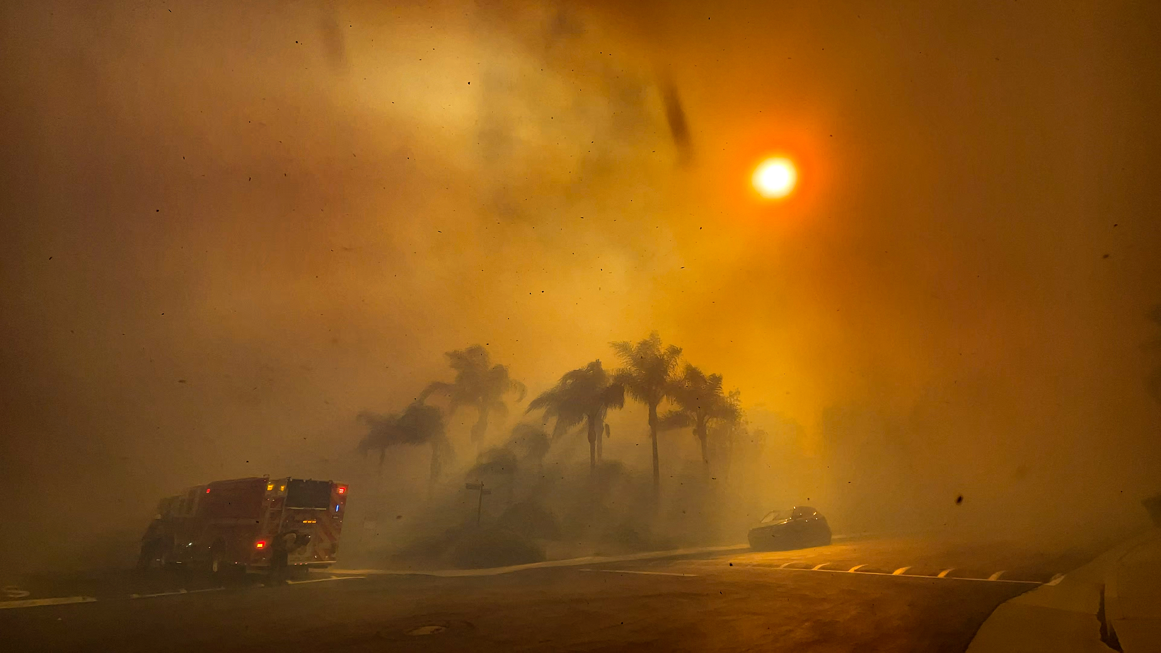 Firefighters battle the Coastal Fire in Laguna Niguel, CA, on Wednesday, May 11, 2022. More than a dozen homes overlooking the ocean in Laguna Niguel were engulfed in flames as a fast-moving brush fire is spreading rapidly amid strong winds. (Photo by Jeff Gritchen/MediaNews Group/Orange County Register via Getty Images)