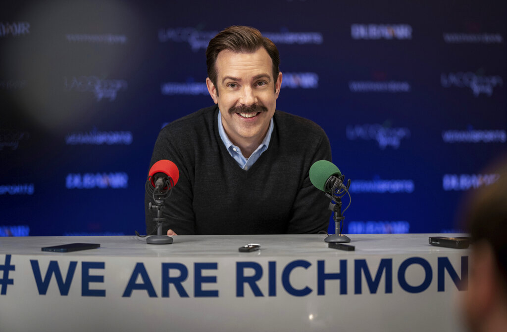 This image released by Apple TV+ shows Jason Sudeikis in a scene from "Ted Lasso." (Colin Hutton/Apple TV+ via AP)