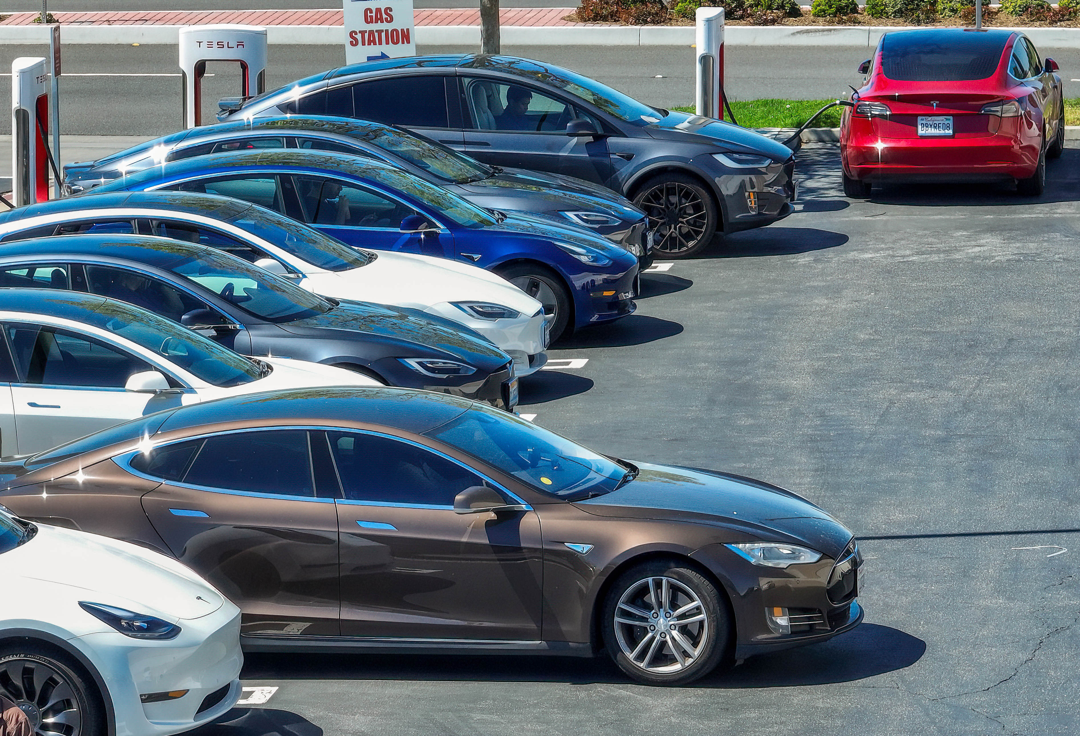 Electric car drivers charge up their vehicles at a Tesla Supercharger in Fountain Valley, CA, on Thursday, March 24, 2022. (Photo by Jeff Gritchen, Orange County Register/SCNG)