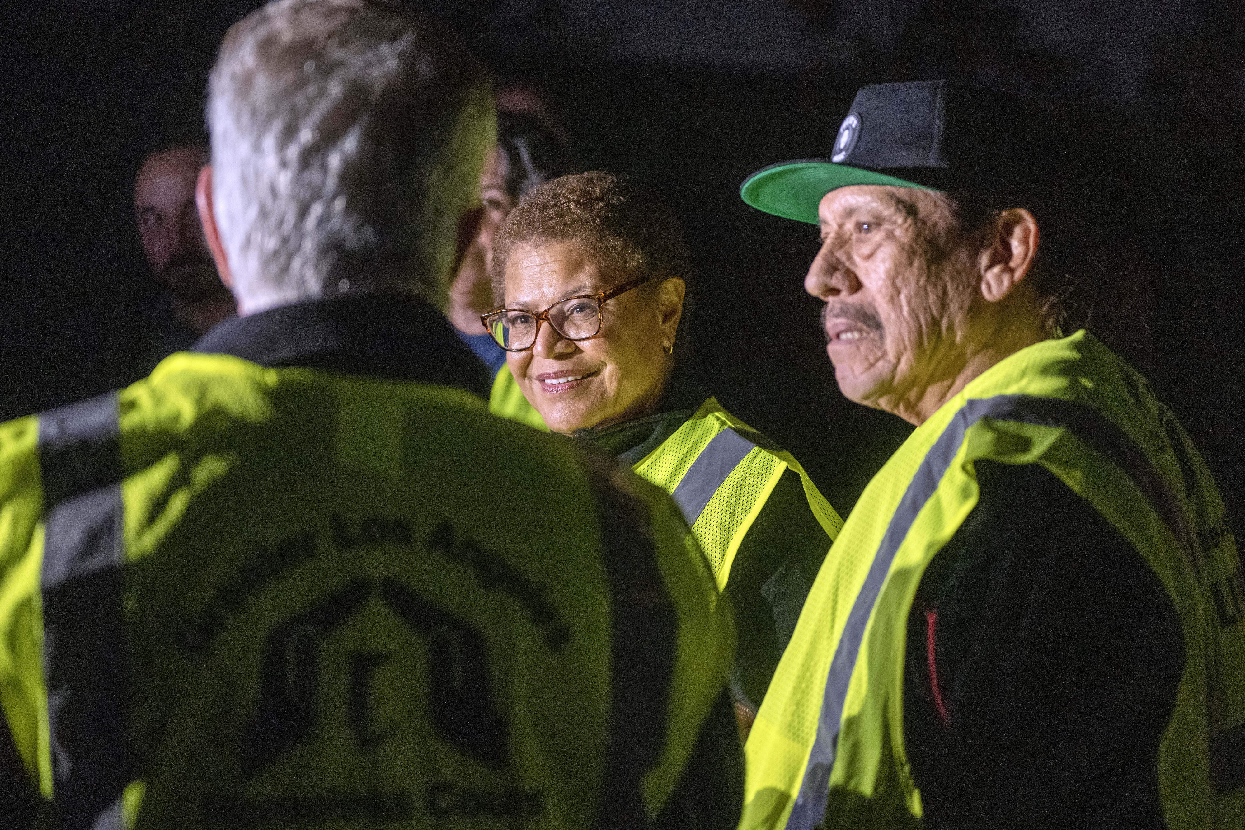 Karen Bass, mayor of Los Angeles, and actor Danny Trejo walk through Alexandria Park in North Hollywood, Calif., during the first night of the 2023 Greater Los Angeles Homeless Count, Tuesday, Jan. 24, 2023. 