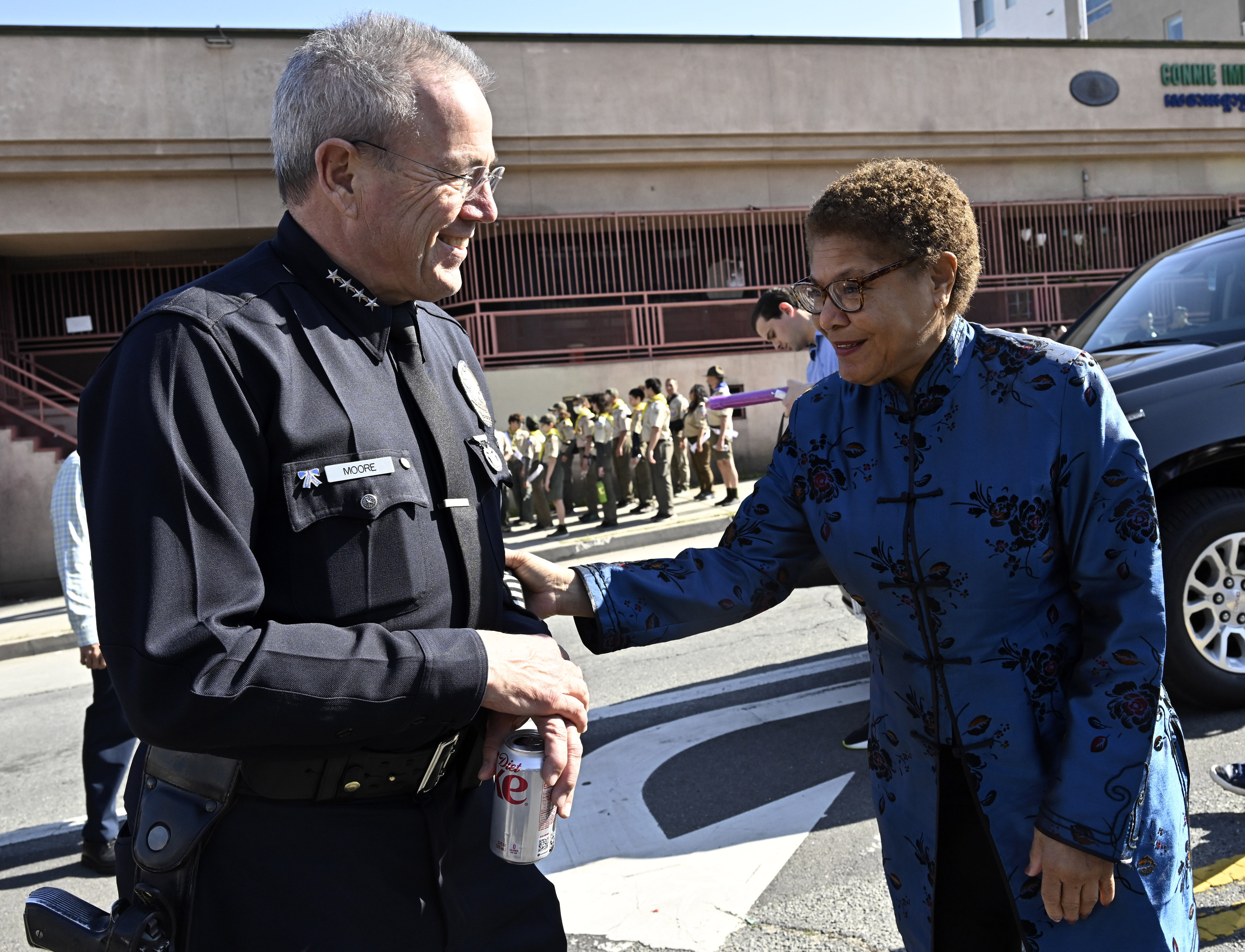Mayor Karen Bass, right, speaks with Los Angeles Police Chief Michael Moore prior to the 124th annual Golden Dragon Parade celebrating the Lunar New Year in Chinatown in Los Angeles on Saturday, January 28, 2023.