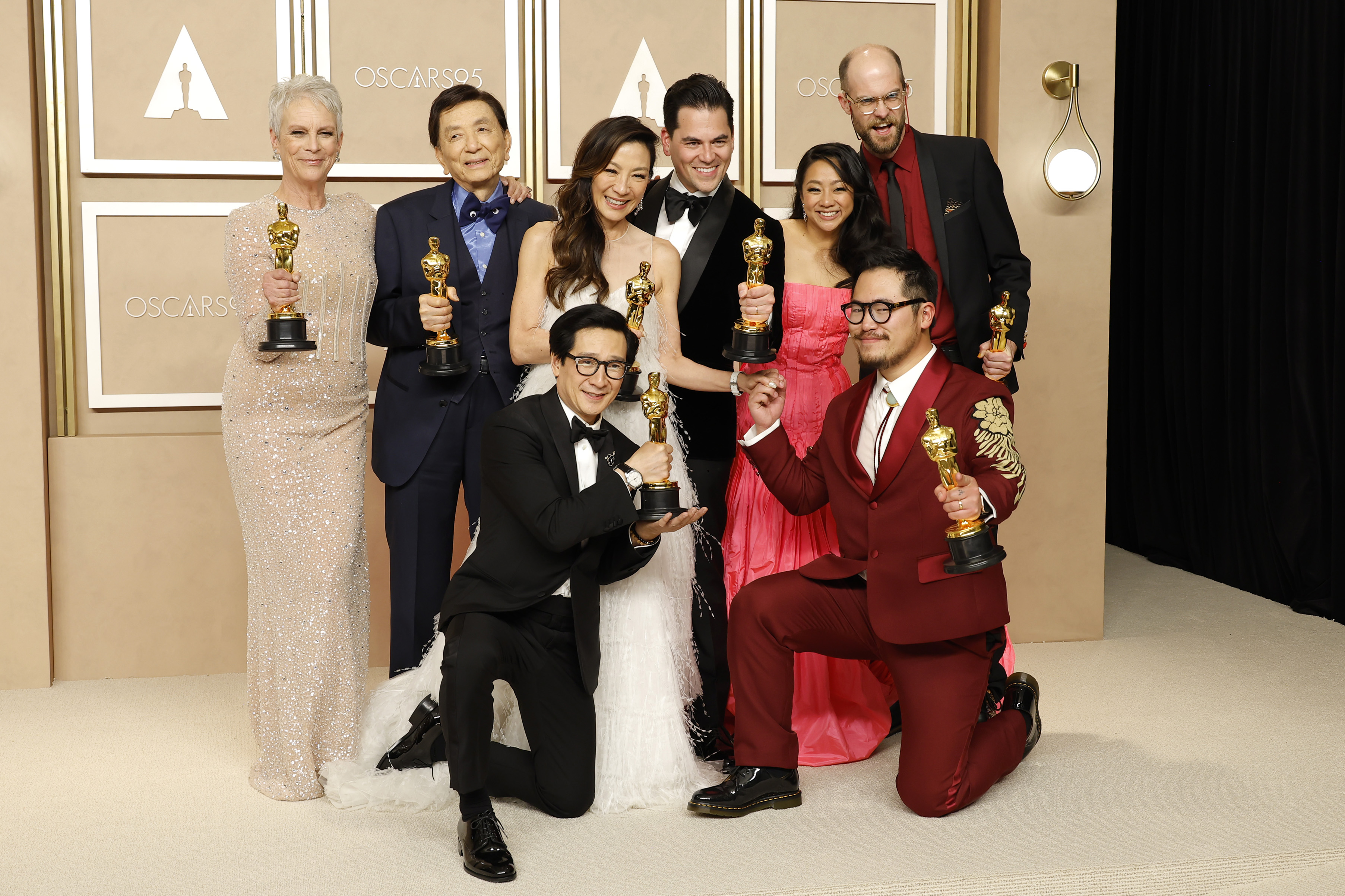 (L-R top row) Jamie Lee Curtis, winner of the Best Supporting Actress award, James Hong, Michelle Yeoh, winner of the Best Actress in a Leading Role award, Jonathan Wang, winner of the Best Picture award, Stephanie Hsu, Daniel Scheinert, winner of the Best Director and Best Picture award and (L-R bottom row) Ke Huy Quan, winner of the Best Actor In A Supporting Role award and Dan Kwan, winner of the Best Director and Best Picture award for "Everything Everywhere All at Once," pose in the press room during the 95th Annual Academy Awards on March 12, 2023 in Hollywood, California. (Photo by Mike Coppola/Getty Images)
