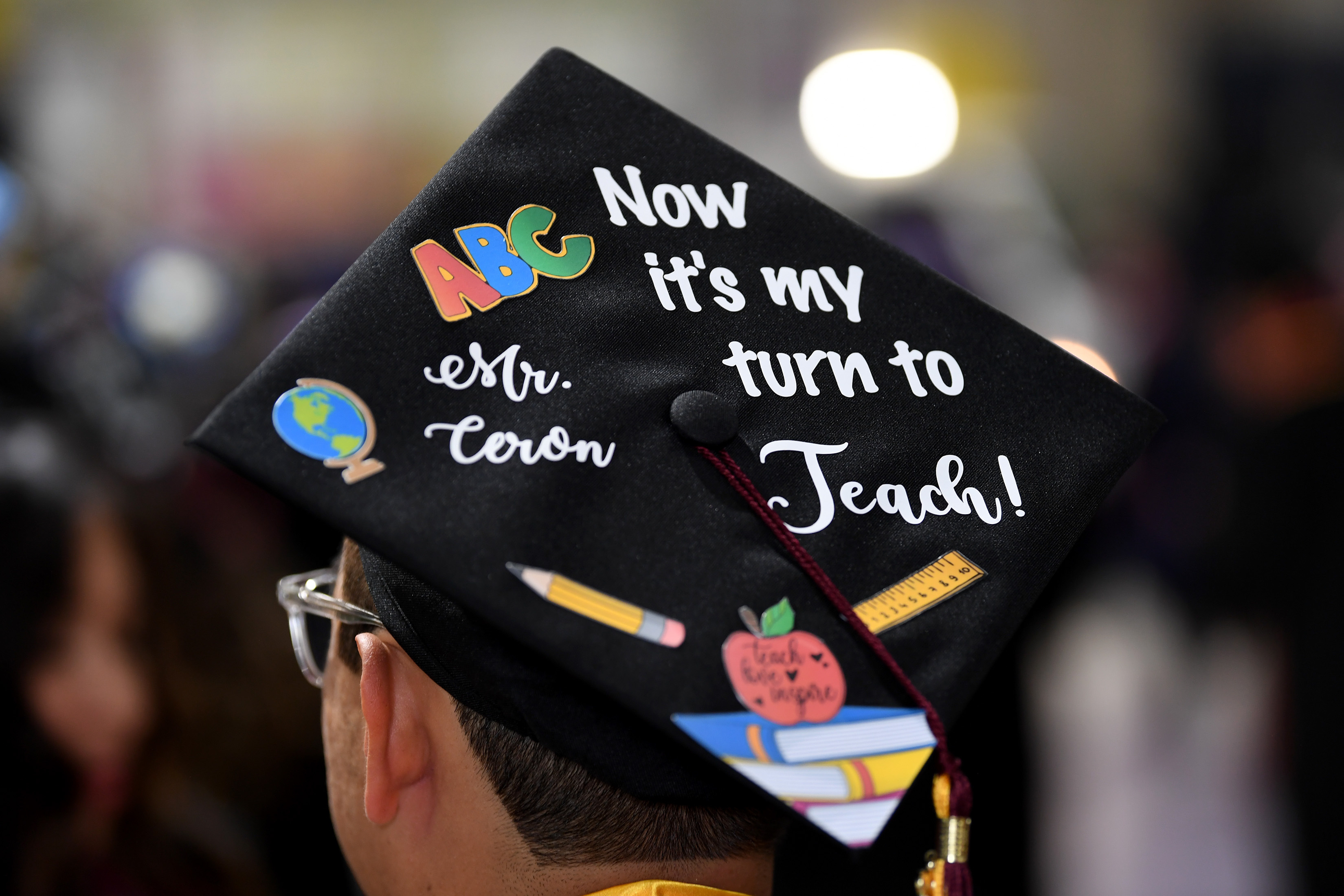 Students and their friends and families attend graduation ceremonies at the College of Arts and Humanities, and the College of Education at the Dignity Sports Health Park Tennis Stadium of Cal State Dominguez Hills on Friday day, May 19, 2023.(Photo by Axel Koester, Contributing Photographer)