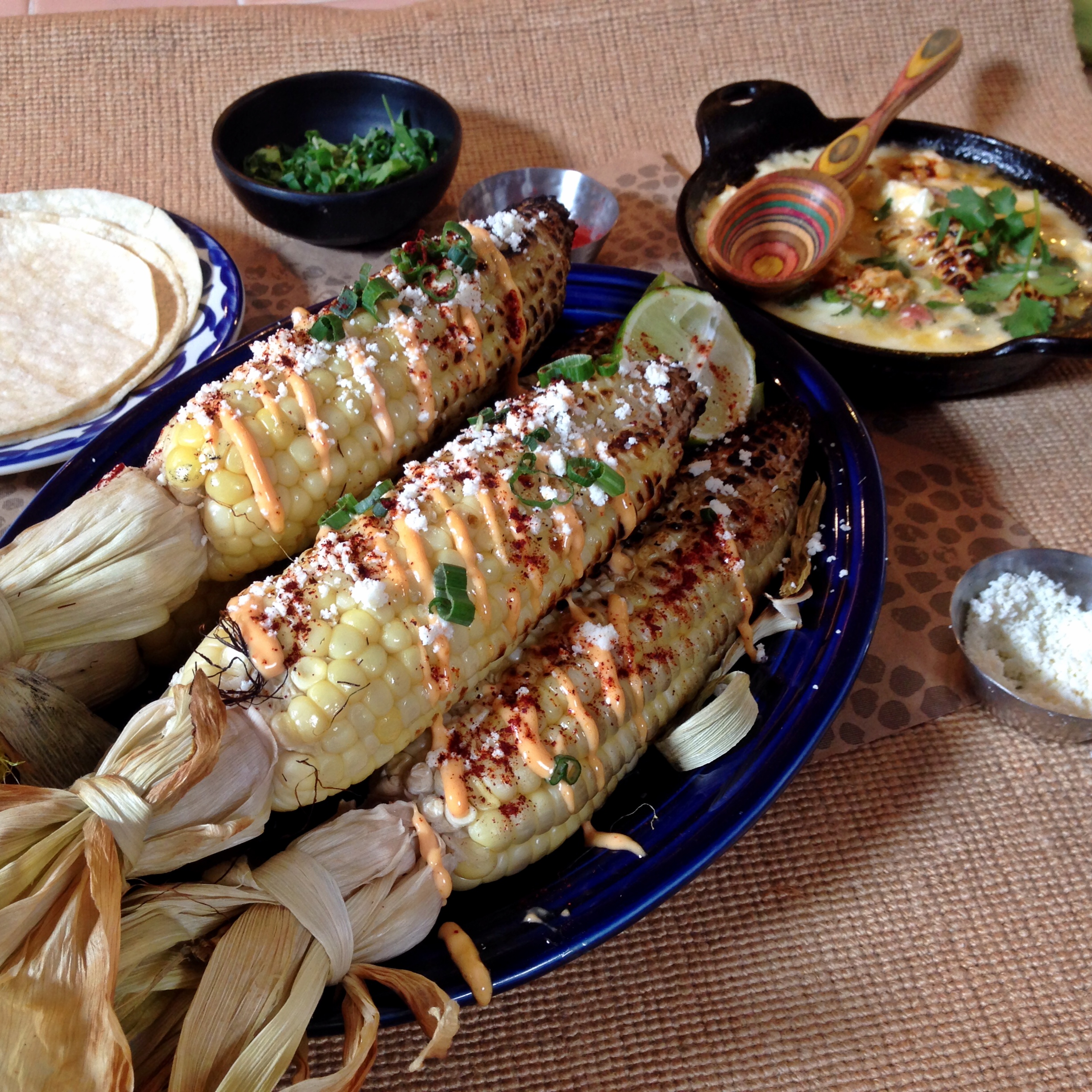 "Elote," or Mexican-style grilled corn, is a tasty and festive dish to serve at a holiday weekend cookout. (Photo by Curt Norris)