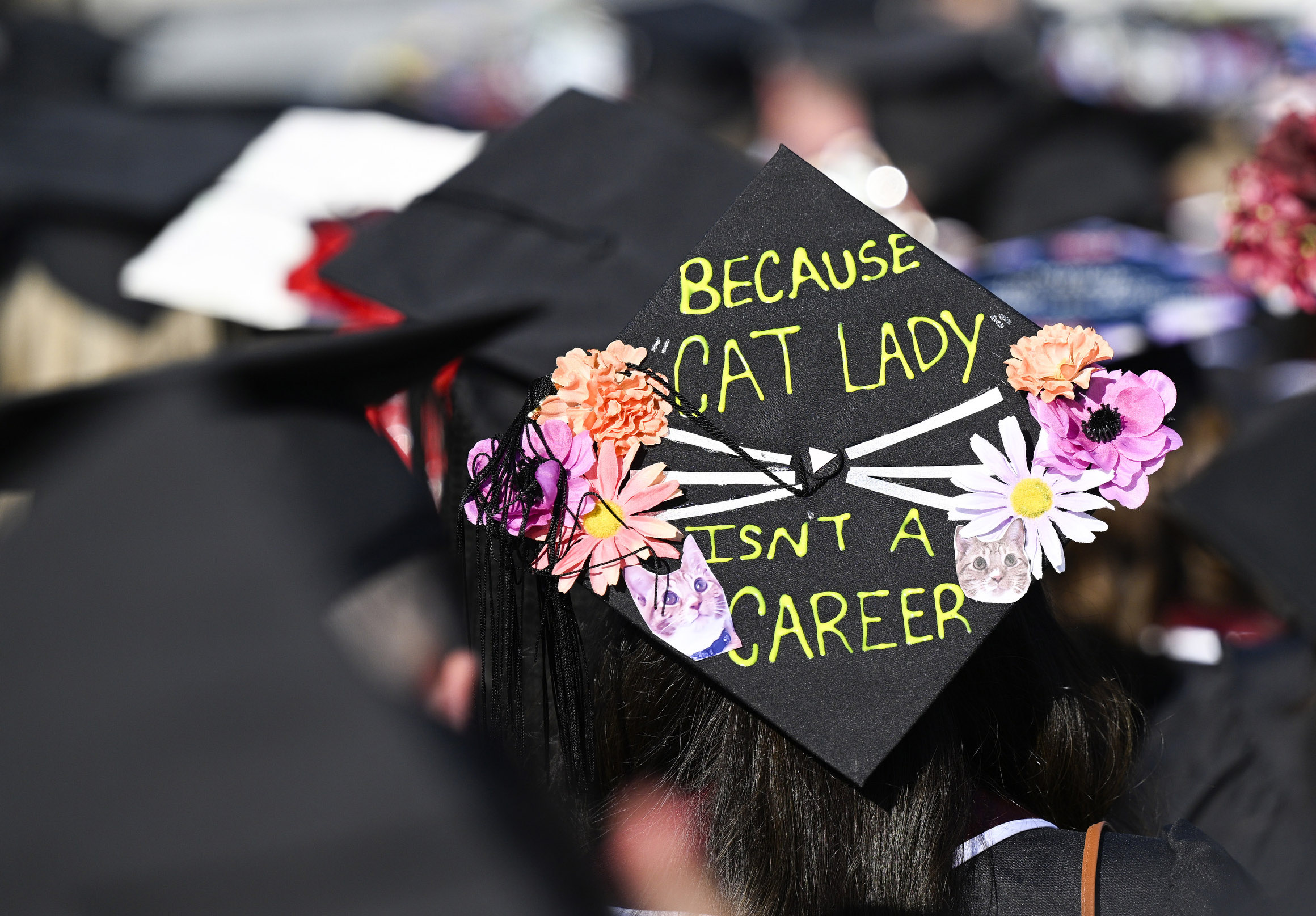 The School of Education students from the University of Redlands decorate their graduation caps in celebration of their achievement of a new career on Friday, April 21, 2023. (Photo by Anjali Sharif-Paul, The Sun/SCNG)