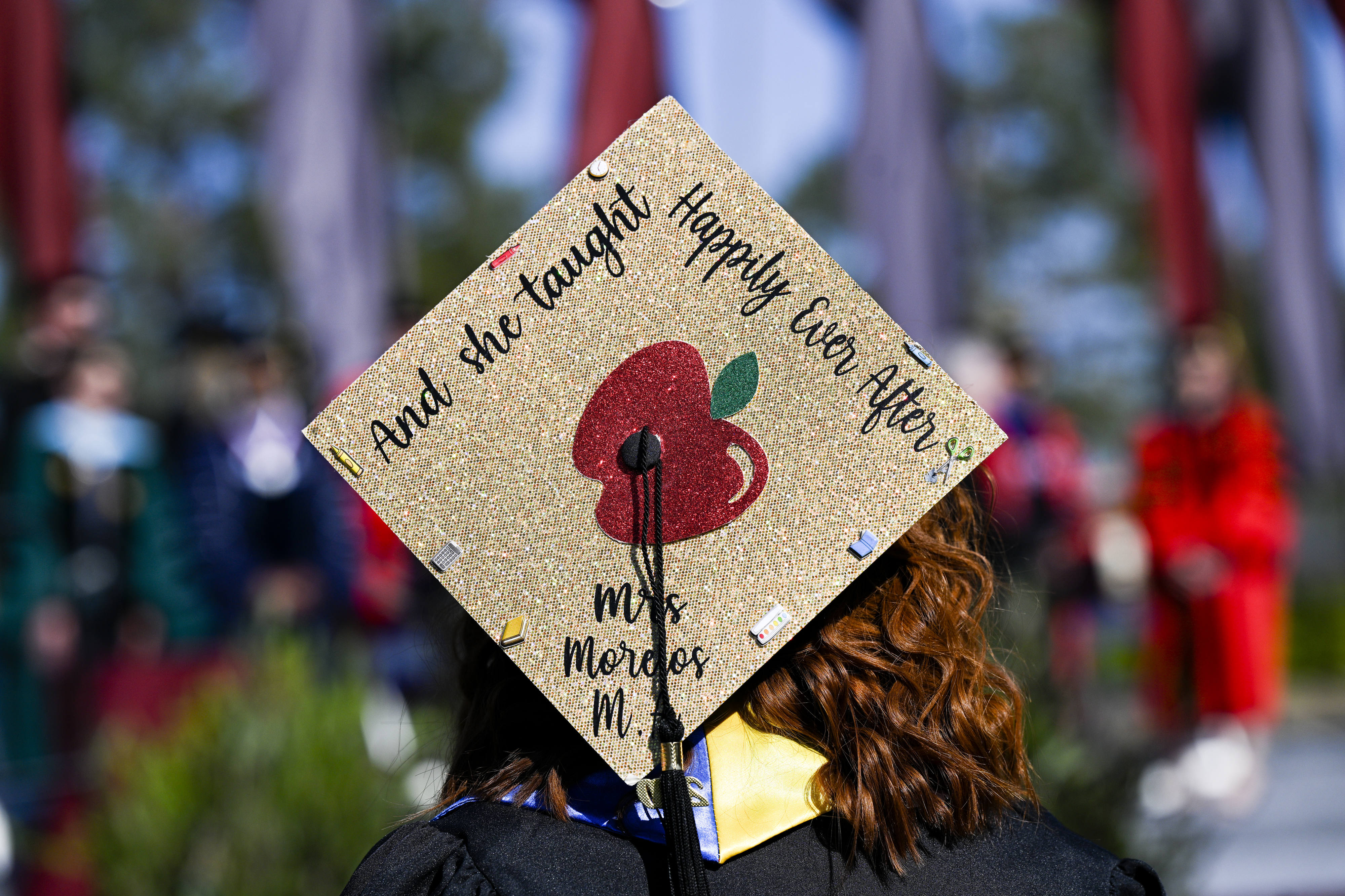The School of Education students from the University of Redlands decorate their graduation caps in celebration of their achievement of a new career on Friday, April 21, 2023. (Photo by Anjali Sharif-Paul, The Sun/SCNG)