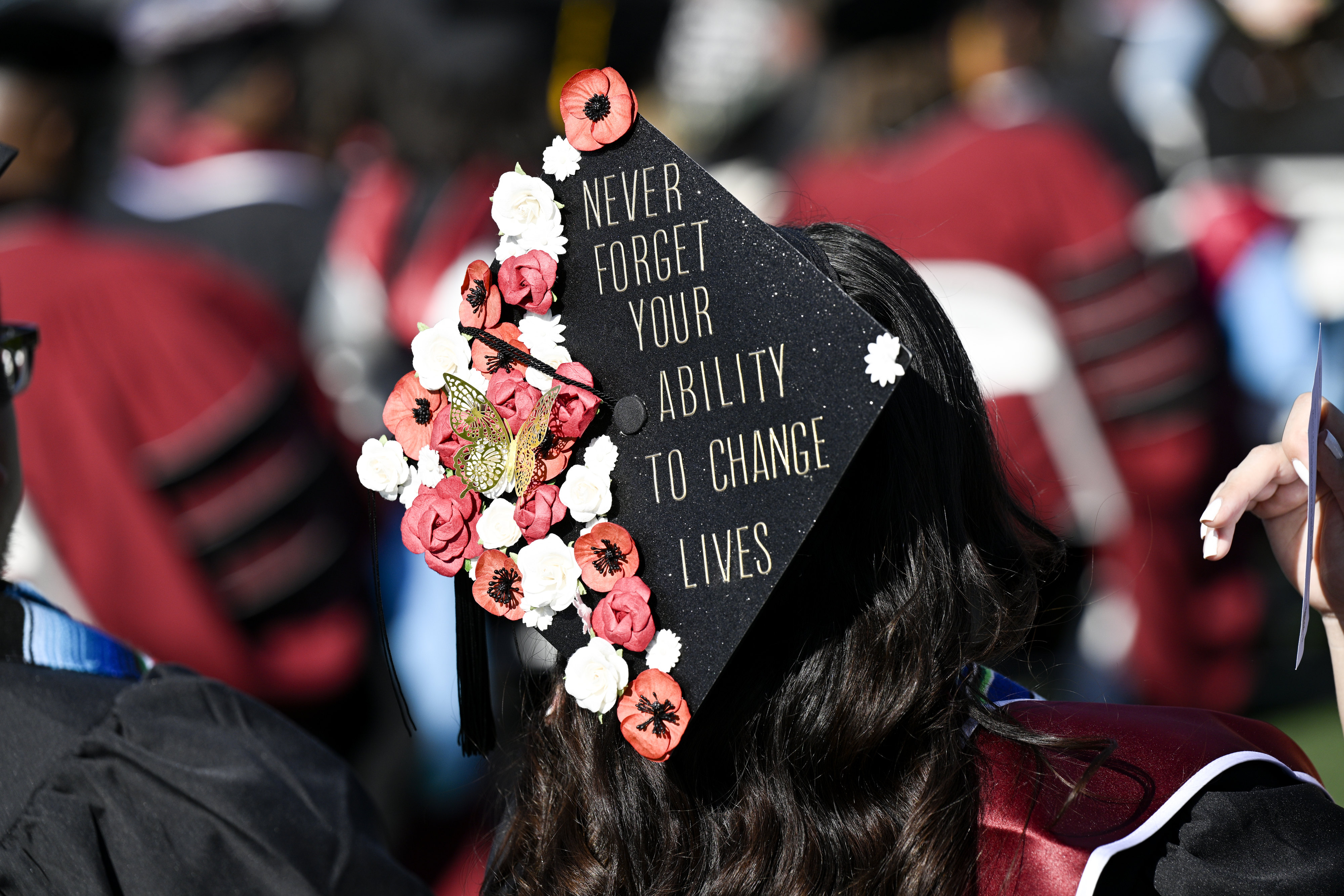 The School of Education students from the University of Redlands decorate their graduation caps in celebration of their achievement of a new career on Friday, April 21, 2023. (Photo by Anjali Sharif-Paul, The Sun/SCNG)