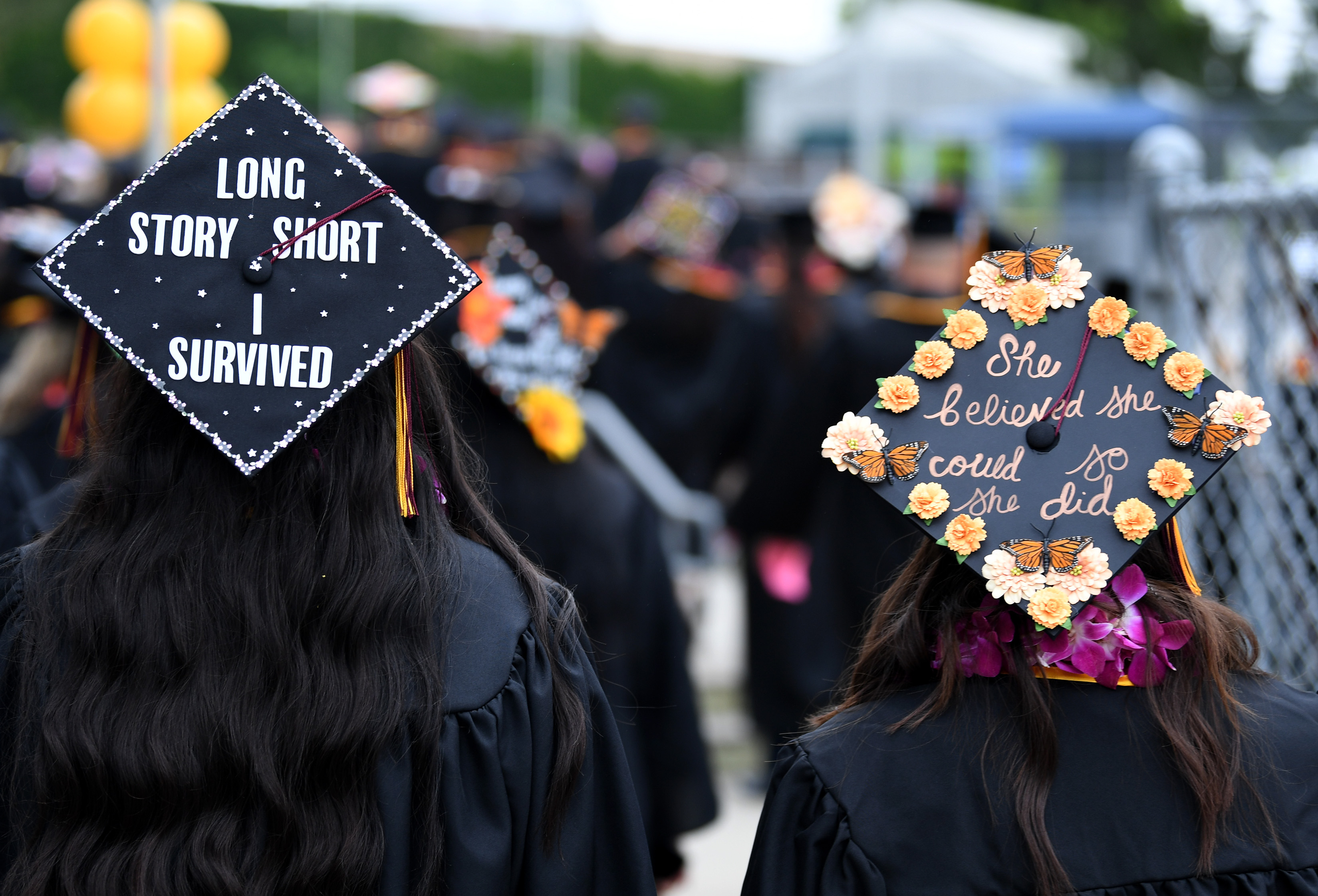 Students and their friends and families attend graduation ceremonies at the College of Arts and Humanities, and the College of Education at the Dignity Sports Health Park Tennis Stadium of Cal State Dominguez Hills on Friday day, May 19, 2023.(Photo by Axel Koester, Contributing Photographer)