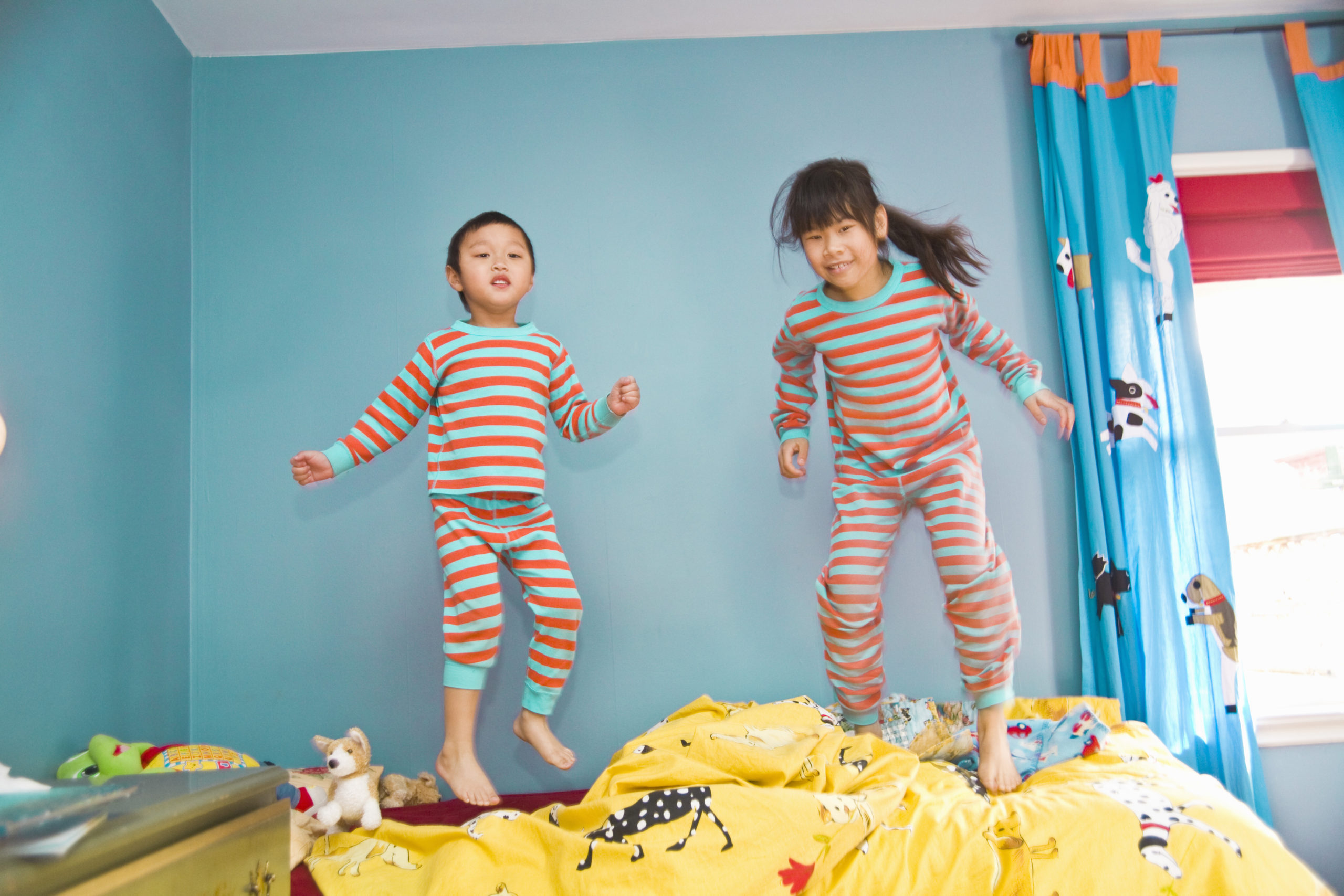 Kids with combined-type ADHD expend some energy jumping on the bed.