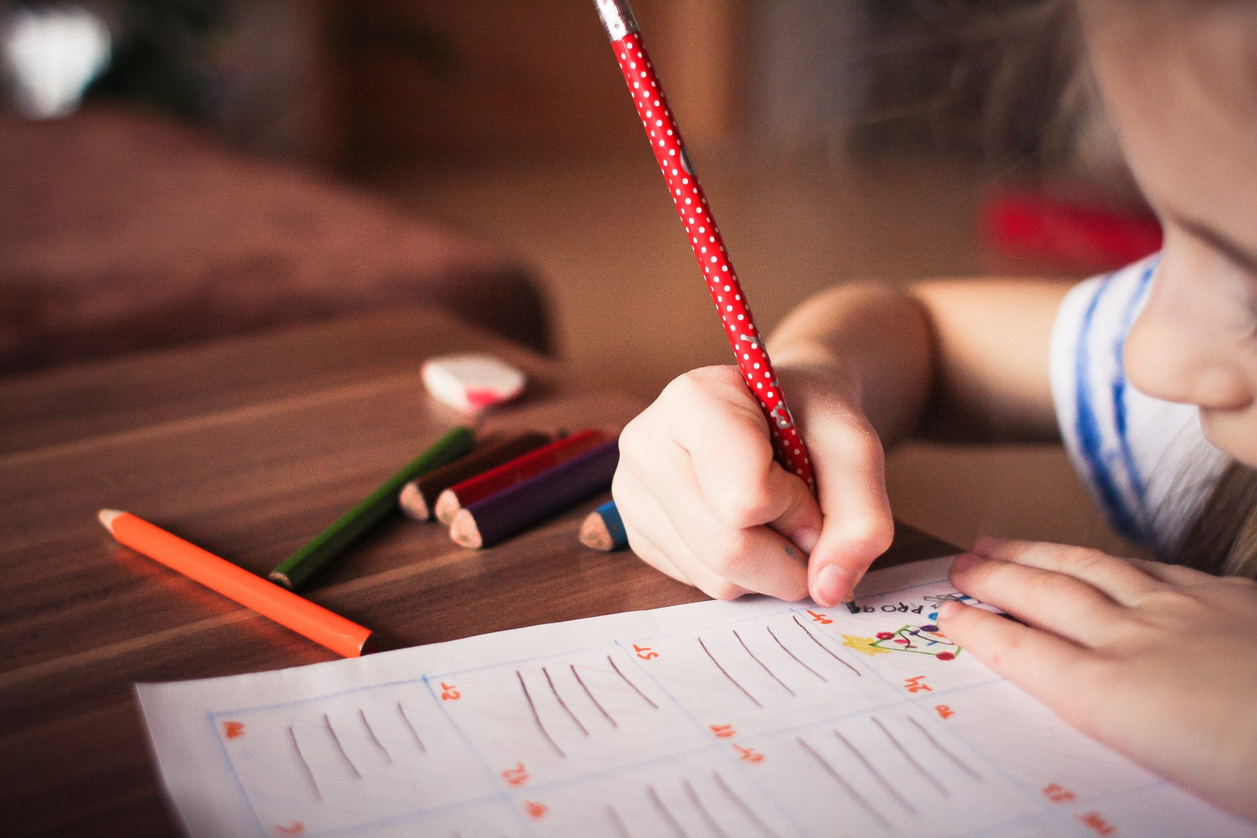 Child working in classroom with learning disabilties