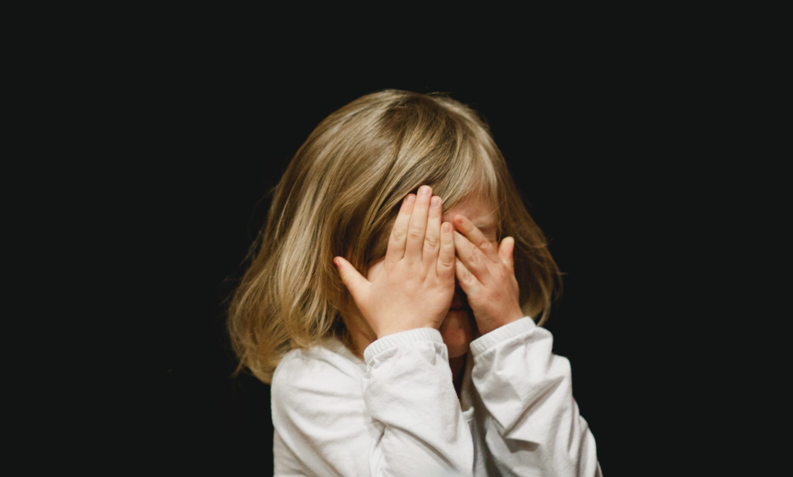Why lie? Child covers her face after telling a fib