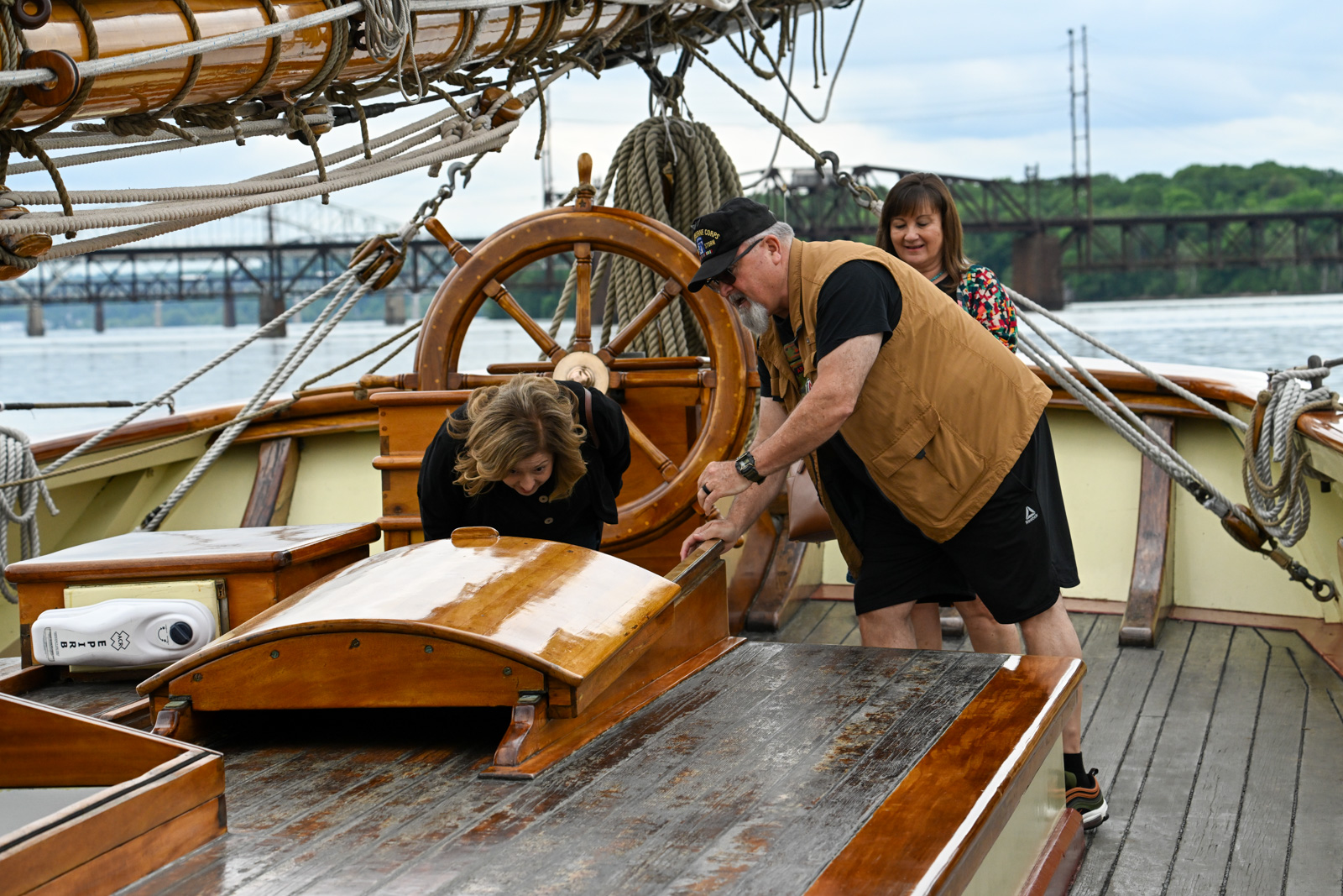 Linda Anderson, of Albuquerque NM, Steve Delgado and Dinnie Delgado, of Essex, tour the Pride of Baltimore ll docked at Frank J. Hutchins Memorial Park dock in Havre de Grace. (Karen Jackson /Freelance)