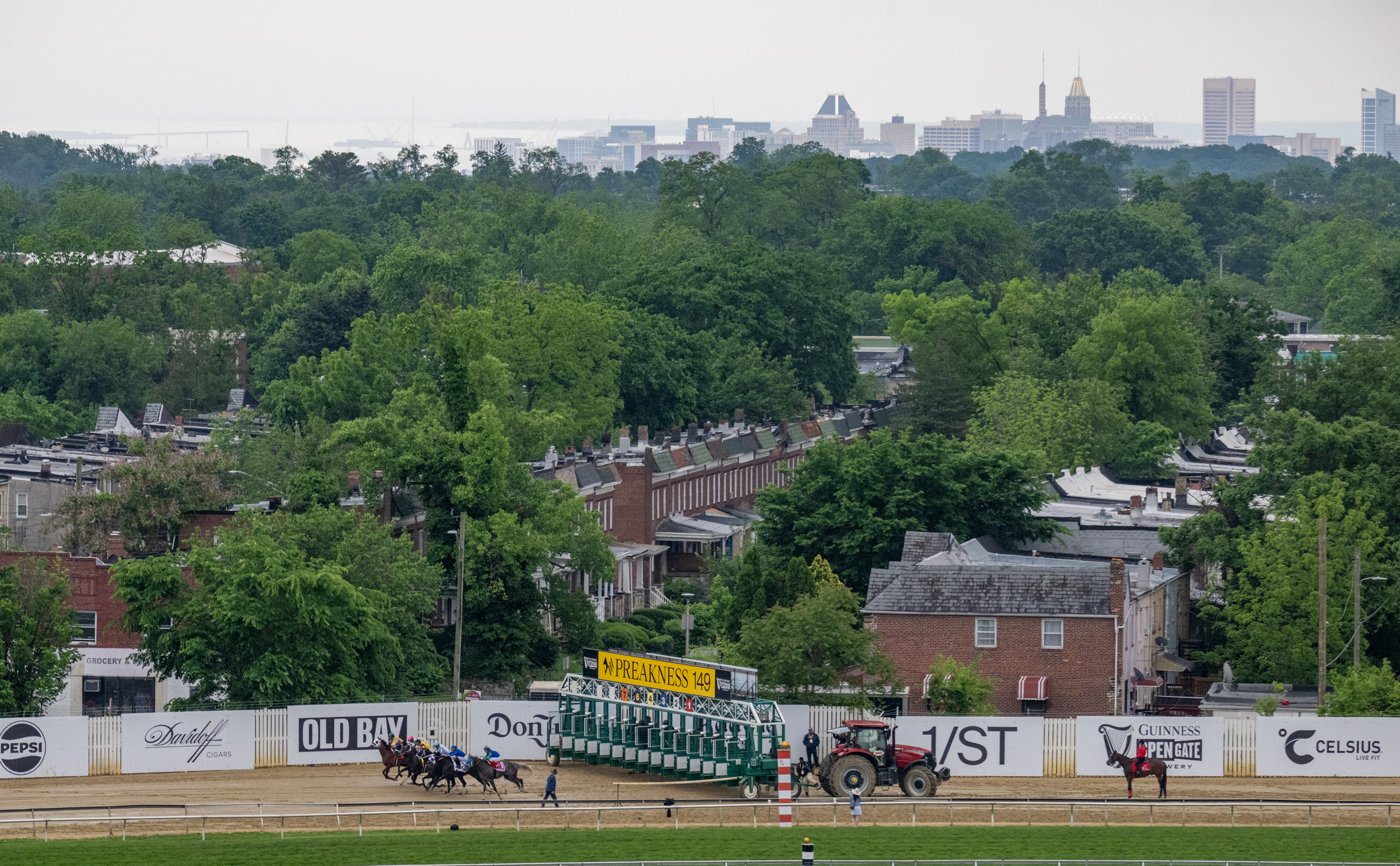 Horses break from the gate at the start of The Maryland Sprint Stakes, the eighth race of the day on Preakness Saturday. (Jerry Jackson/Staff)