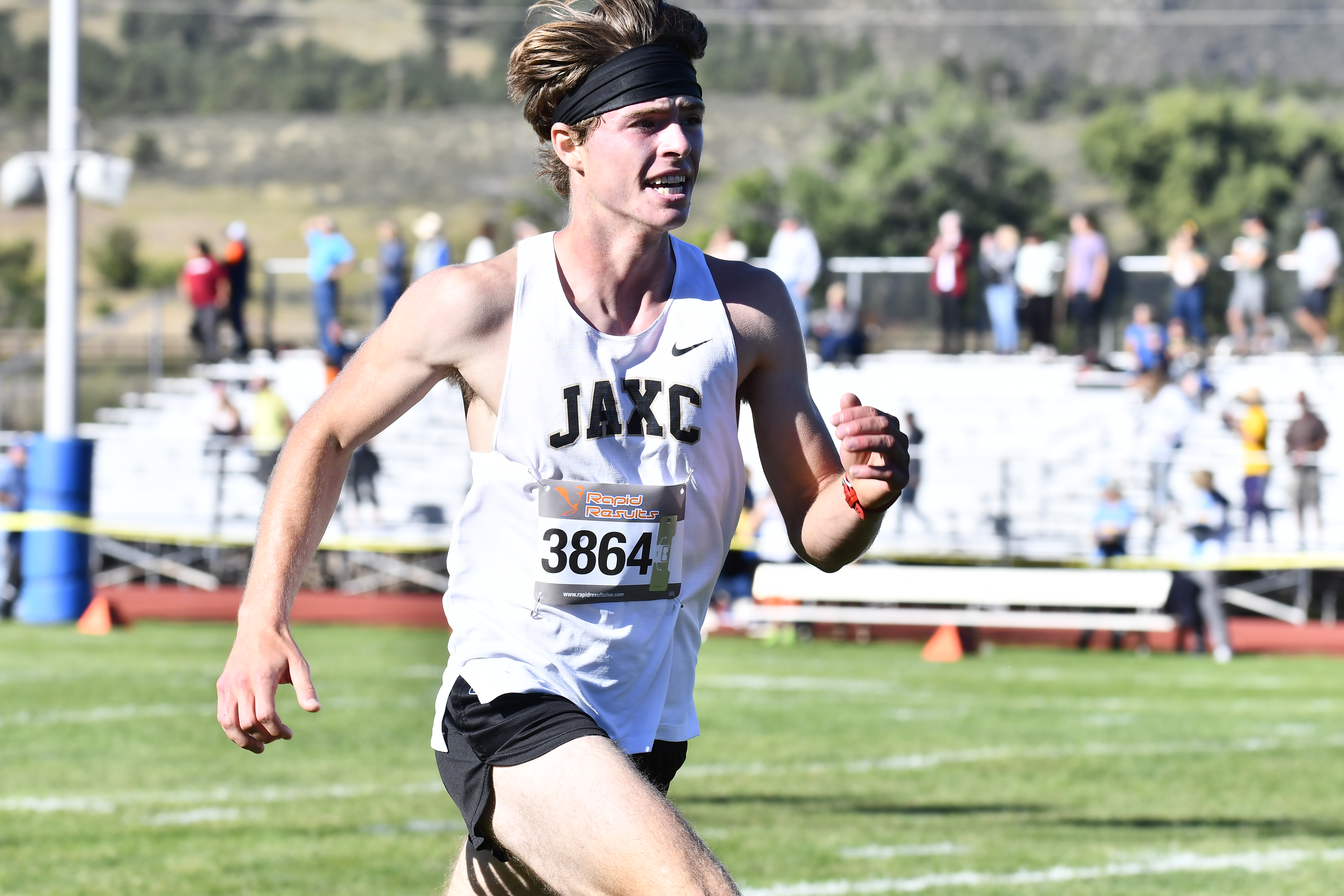 Jefferson Academy's Sean Beasley nears the finish line of the Lyons High School cross country course at the St. Vrain Invite on Sept. 16, 2023. (Alissa Noe/BoCoPreps.com)