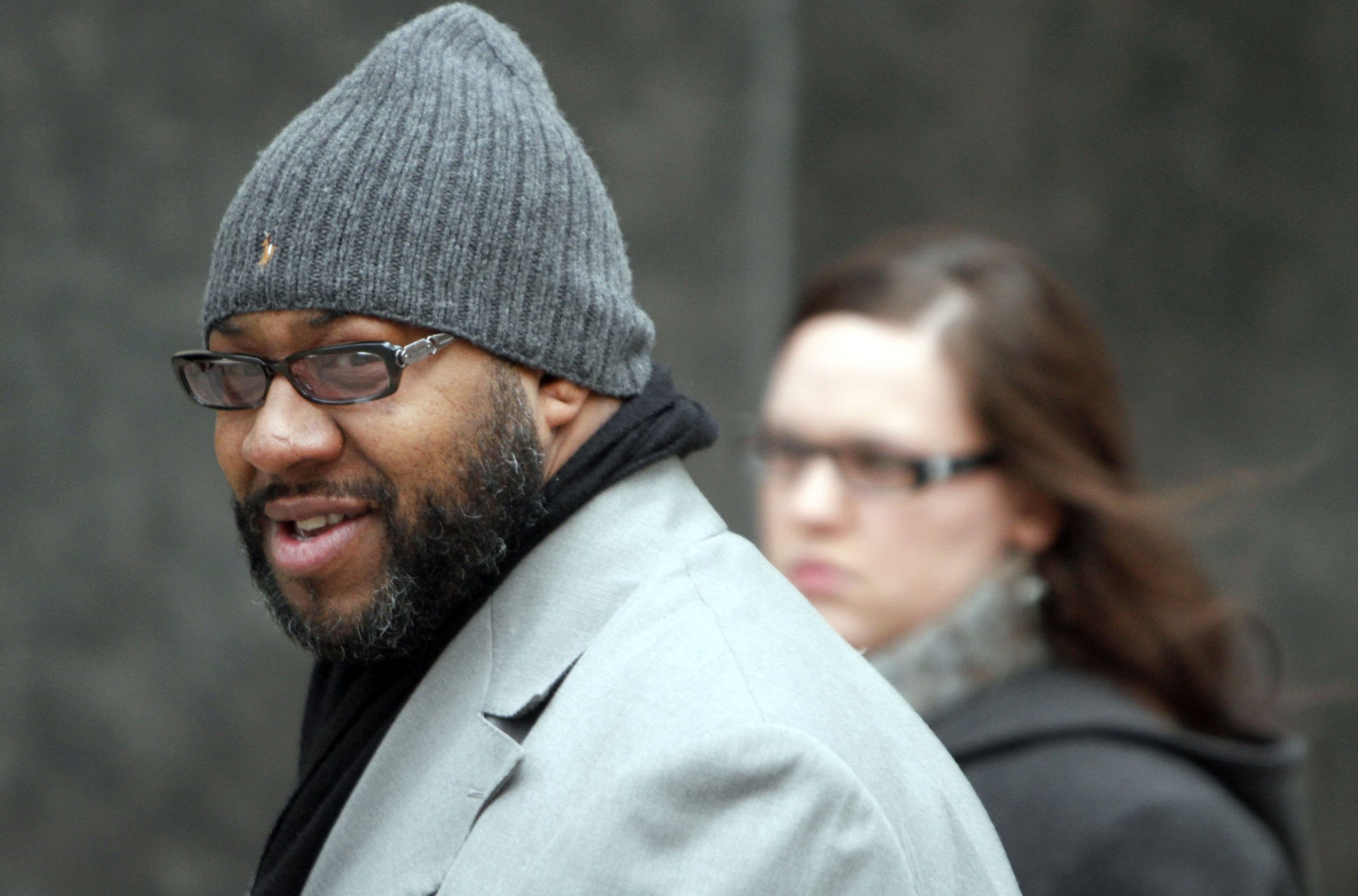 Contractor Bobby Ferguson makes his way into Federal Court in Detroit, Monday, Jan. 7, 2013.