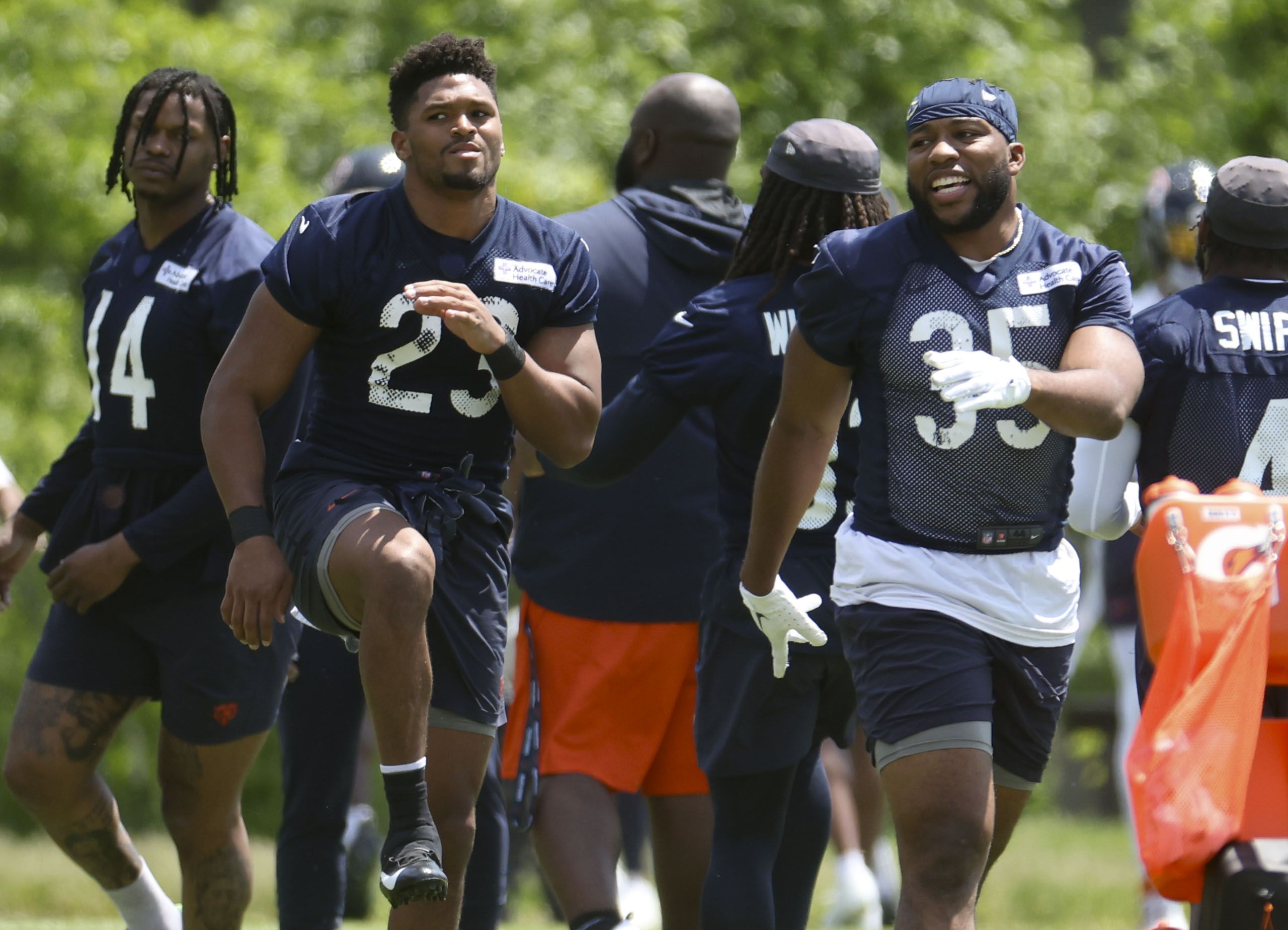 Chicago Bears running back Roschon Johnson (23) and fullback Khari Blasingame (35) work out Thursday, May 23, 2024, during OTAs at Halas Hall. (Brian Cassella/Chicago Tribune)