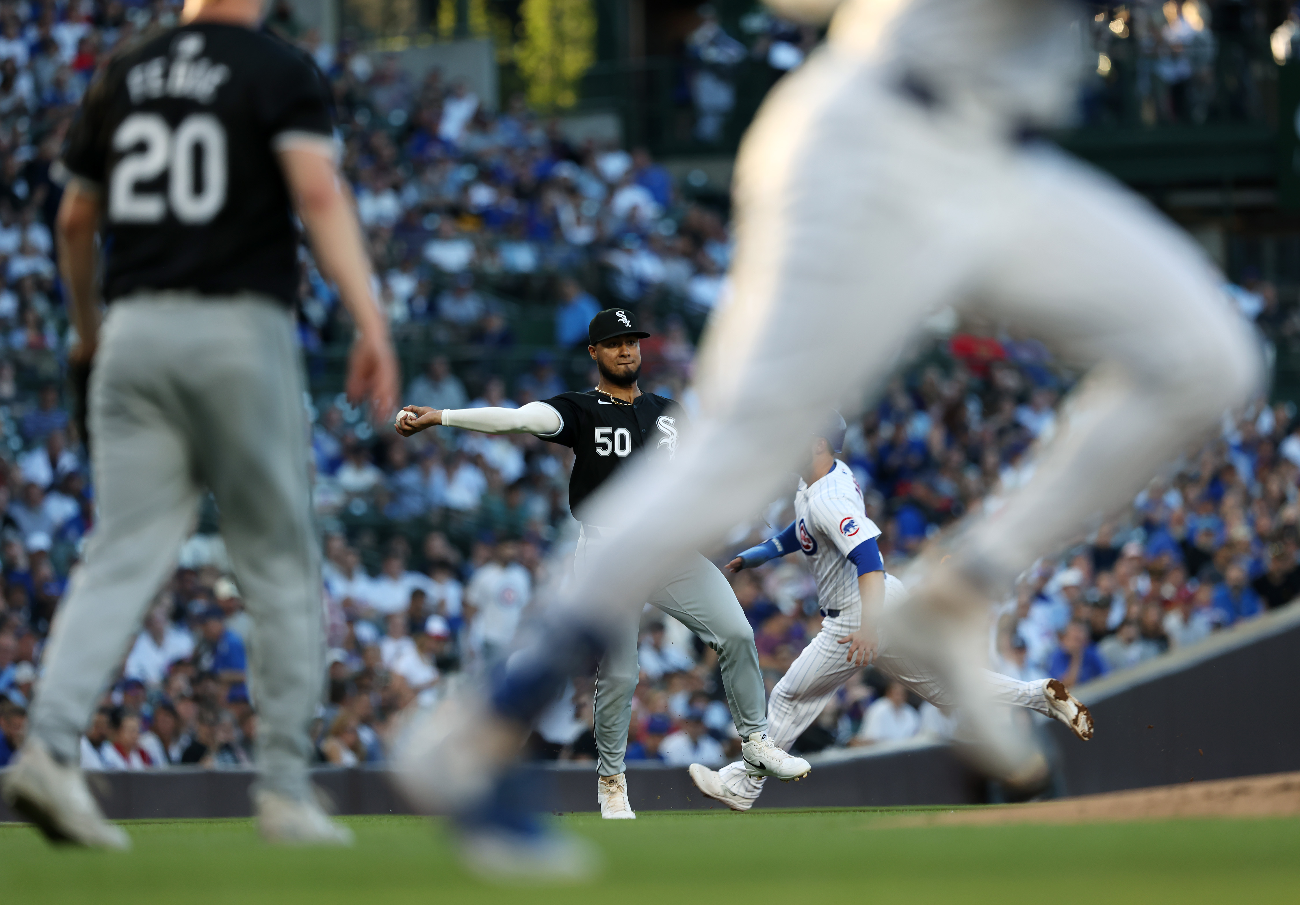 White Sox third baseman Lenyn Sosa (50) throws to first base for an out against the Cubs in the second inning at Wrigley Field on June 5, 2024, in Chicago. (John J. Kim/Chicago Tribune)