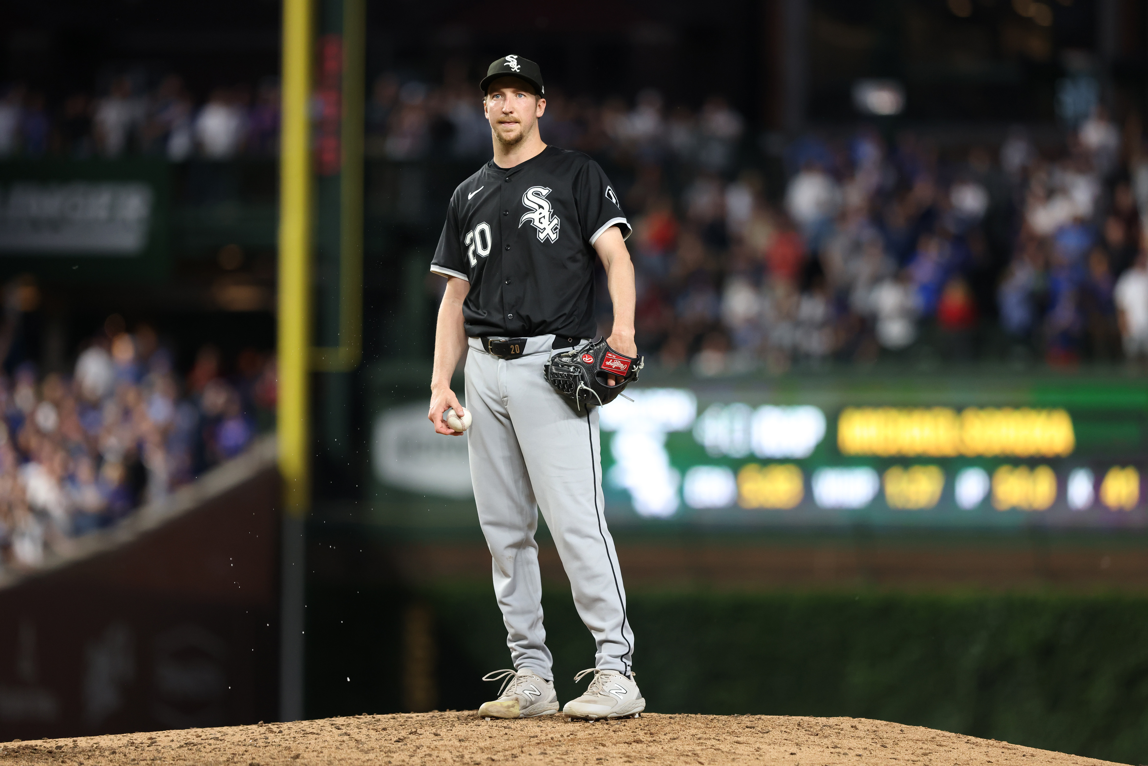 White Sox pitcher Erick Fedde stands on the mound after giving up a run on a balk in the fifth inning against the Cubs at Wrigley Field on June 5, 2024, in Chicago. (John J. Kim/Chicago Tribune)