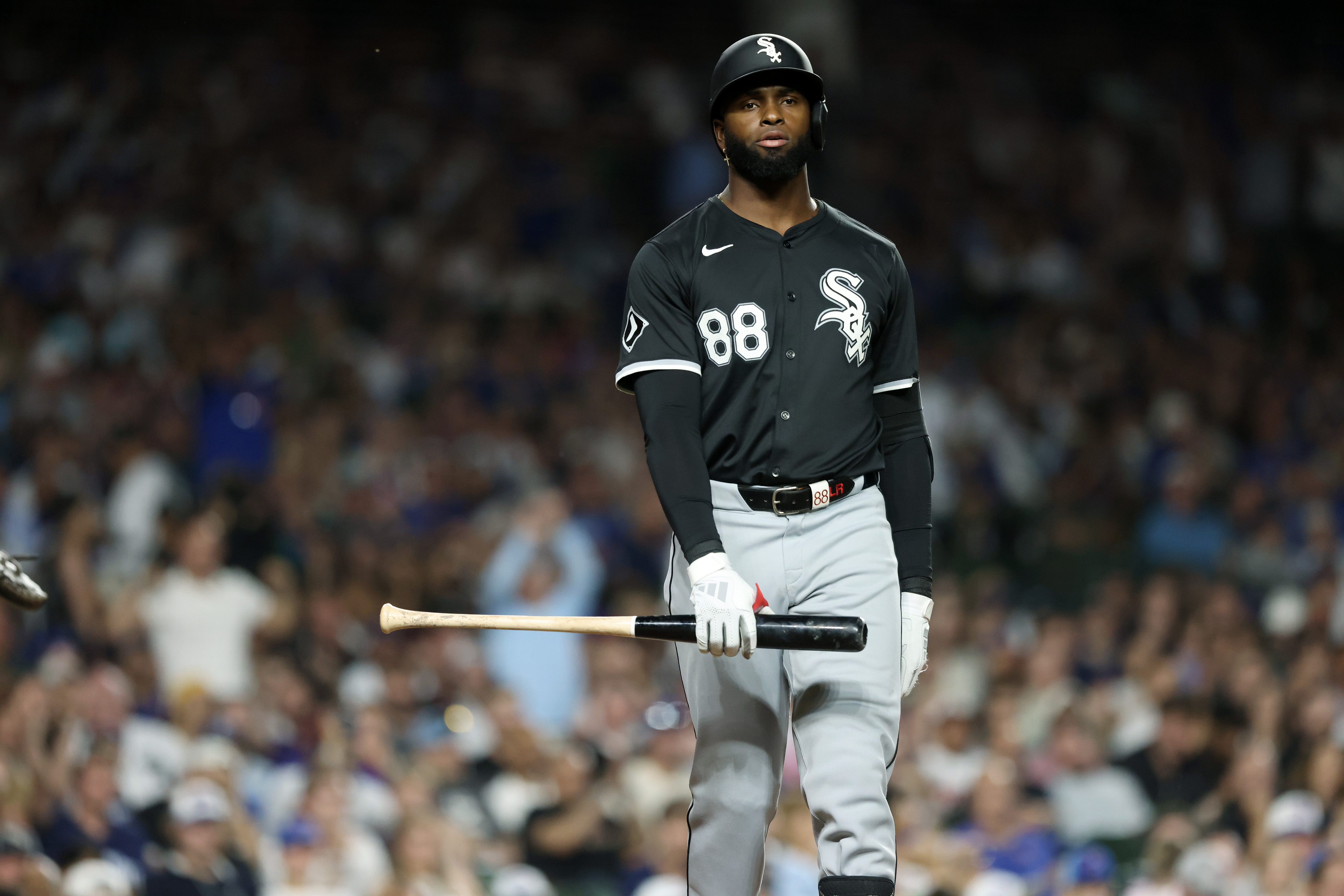 White Sox centerfielder Luis Robert Jr. heads to the dugout after striking out swinging in the ninth inning against the Cubs at Wrigley Field on June 5, 2024, in Chicago. (John J. Kim/Chicago Tribune)