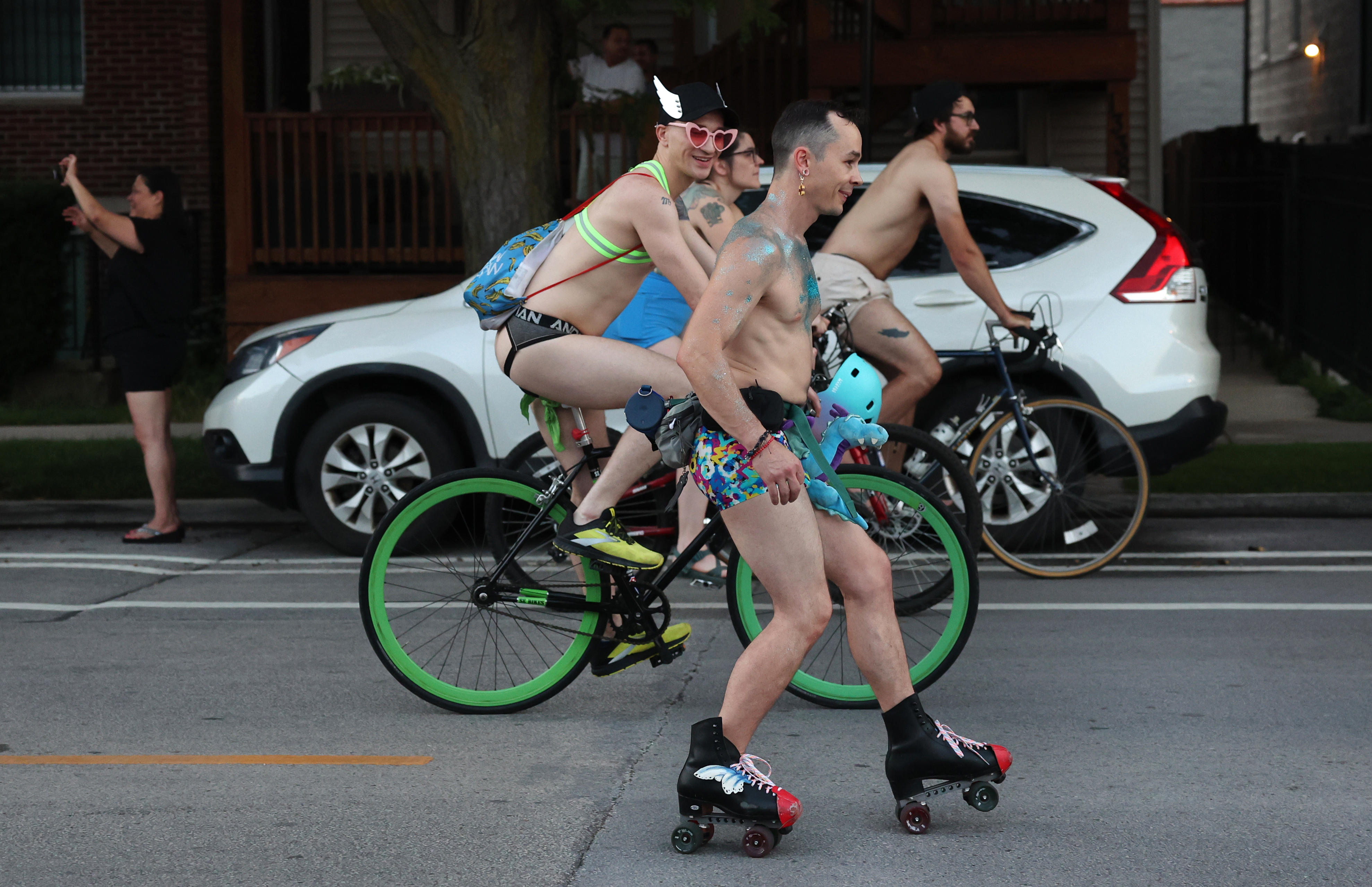 People participate in the World Naked Bike Ride through Chicago on June 29, 2024. (Chris Sweda/Chicago Tribune)