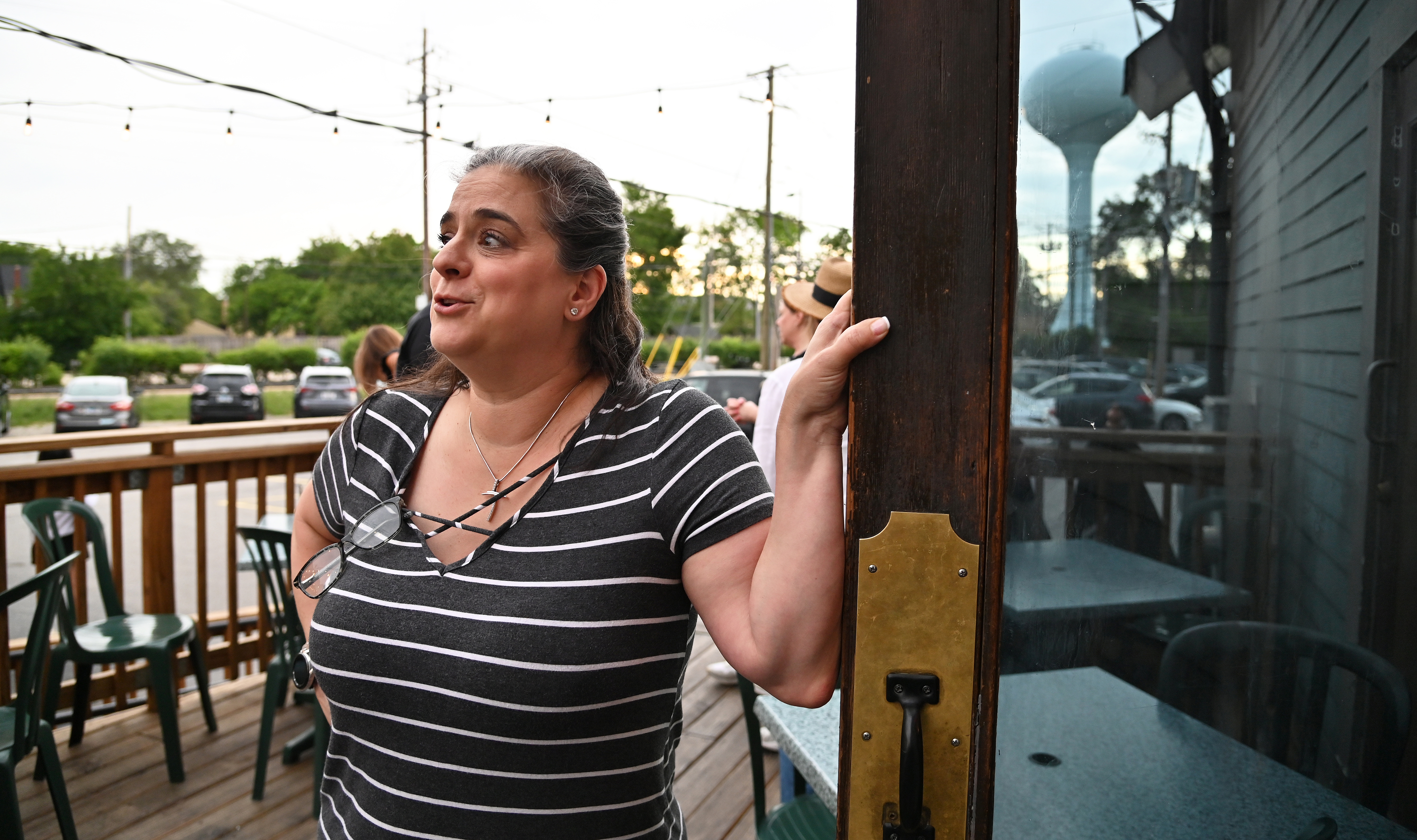 Helene Kapetaneas, co-owner of The Landmark Inn Bar and Grille, has just learned of the possibility of a 1 % food and beverage tax coming to Northbrook. Taken in downtown Northbrook at the restaurant on June 25, 2024. (Karie Angell Luc/Pioneer Press)