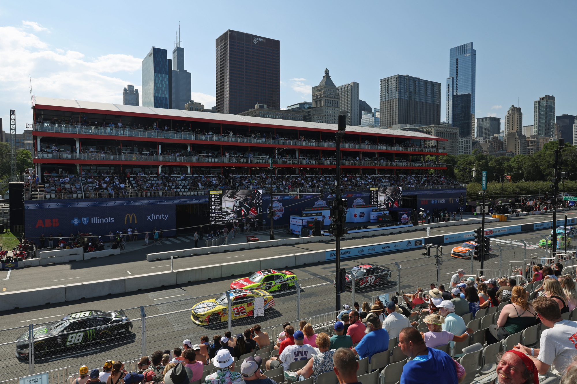 Fans watch as the NASCAR Xfinity Series race resumes after a caution flag Saturday, July 6, 2024, in Chicago. (John J. Kim/Chicago Tribune)