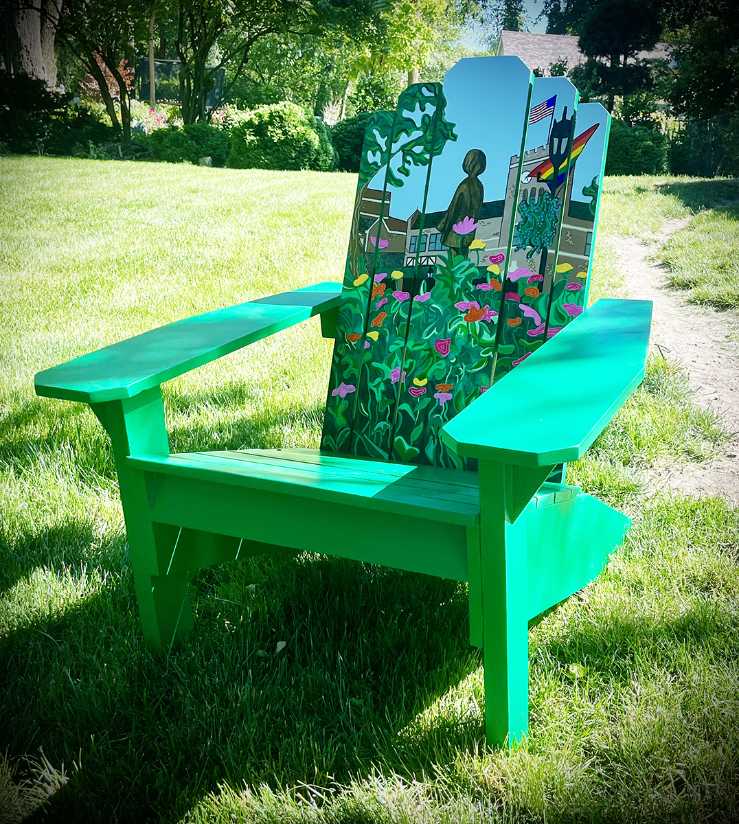 An Adirondack chair that was built and painted by Flossmoor Mayor Michelle Nelson features a scene of downtown Flossmoor in the summertime and is among art items being auctioned off as a fundraiser to help with upkeep of the village's public art collection. (Village of Flossmoor)