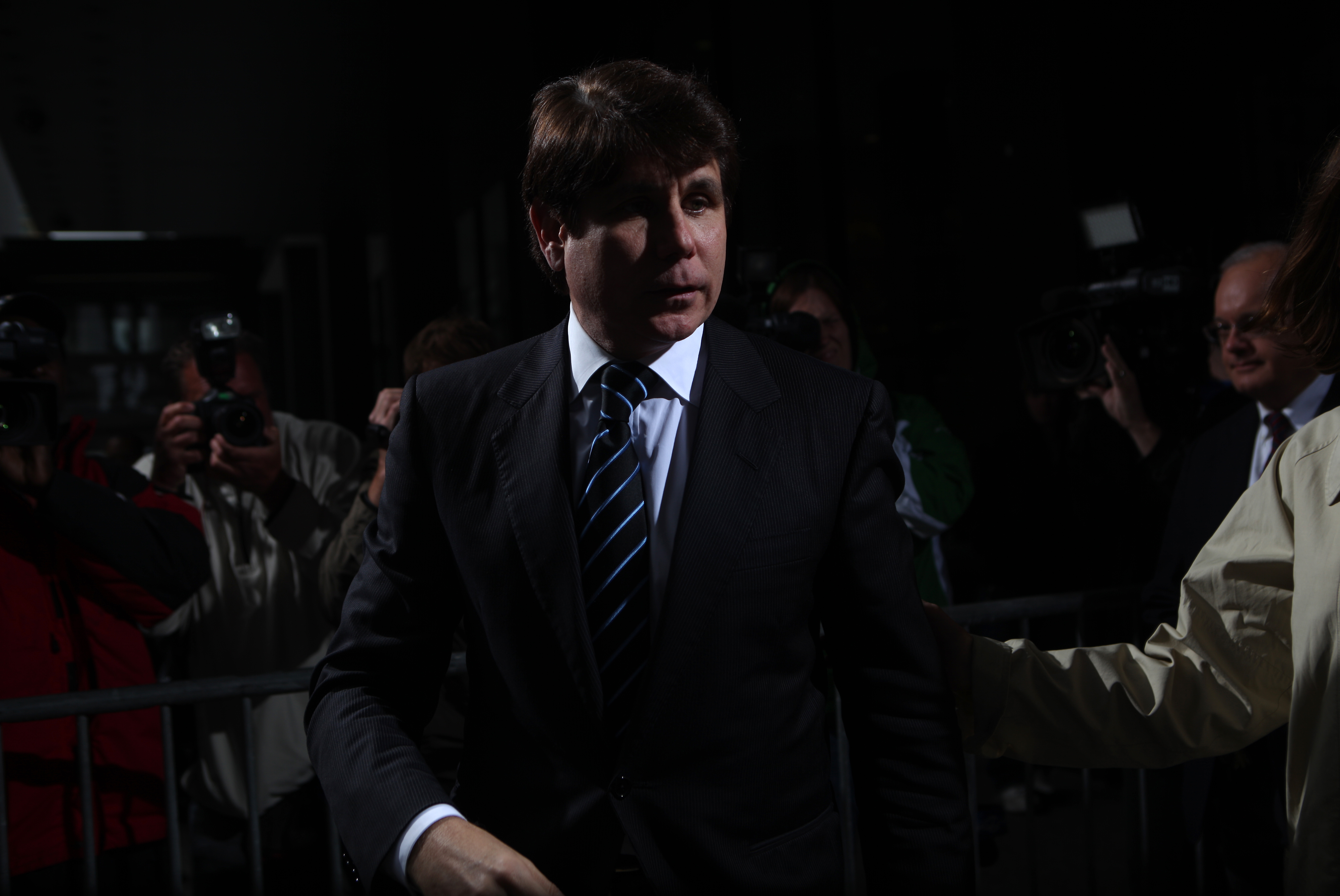 Former Gov. Rod Blagojevich leaves court after closing arguments in his corruption retrial at Dirksen U.S. Courthouse, June 9, 2011. (E. Jason Wambsgans/ Chicago Tribune)