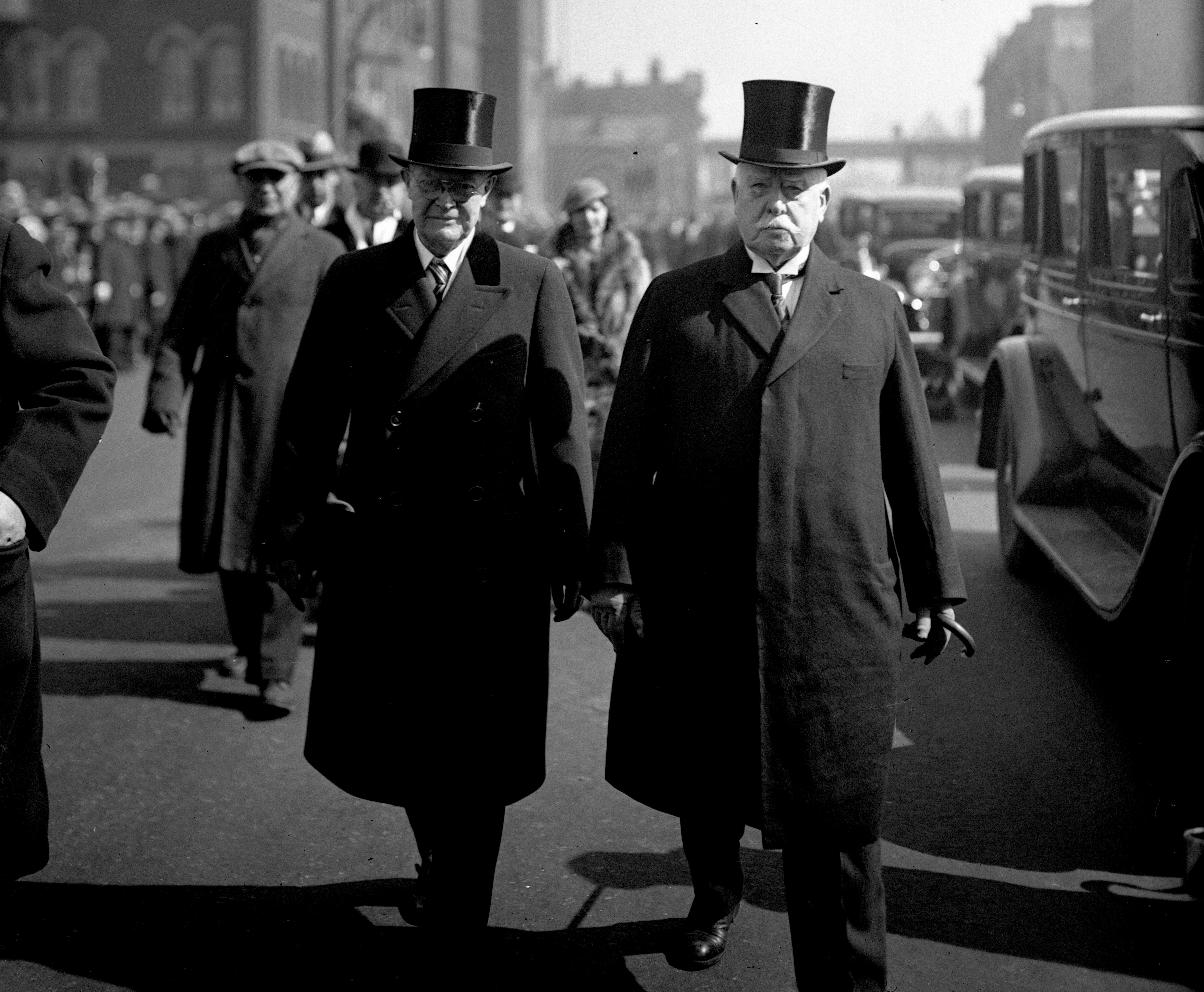 Former Chicago Mayor Carter Harrison Jr., right, walks in 1933 with another ex-mayor, Edward F. Dunne. Harrison once called aldermen "a low-browed, dull-witted, base-minded gang of plug uglies." (Chicago Tribune historical photo)