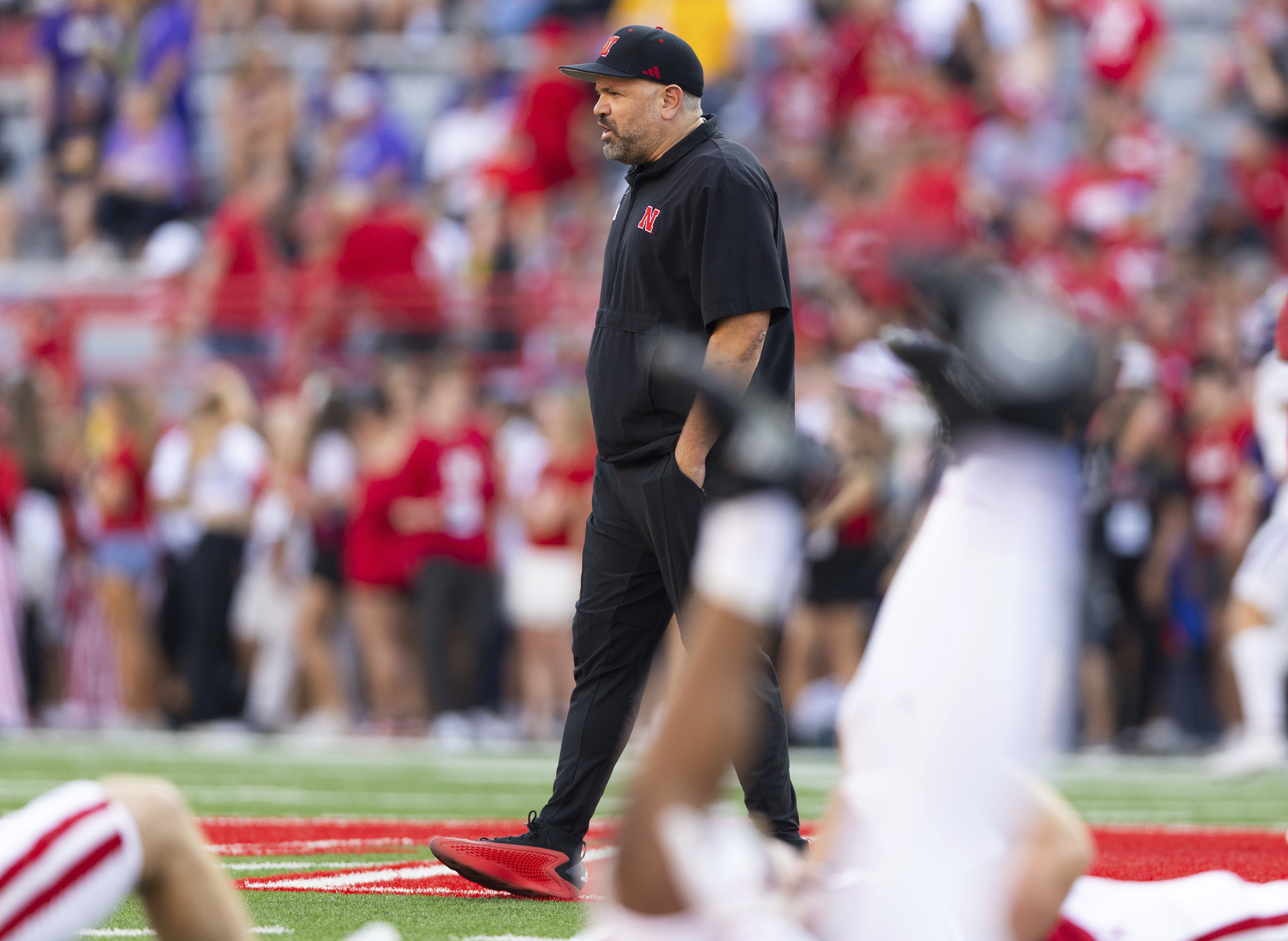 Nebraska coach Matt Rhule walks around as his team warms up before playing against Northern Iowa on Sept. 14, 2024, in Lincoln, Neb. (AP Photo/Rebecca S. Gratz)